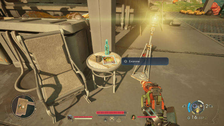 A first-person view in the game 'The Lamplighters League' shows a character aiming a weapon at a table with a magazine and a bottle, with an option to 'Examine'.