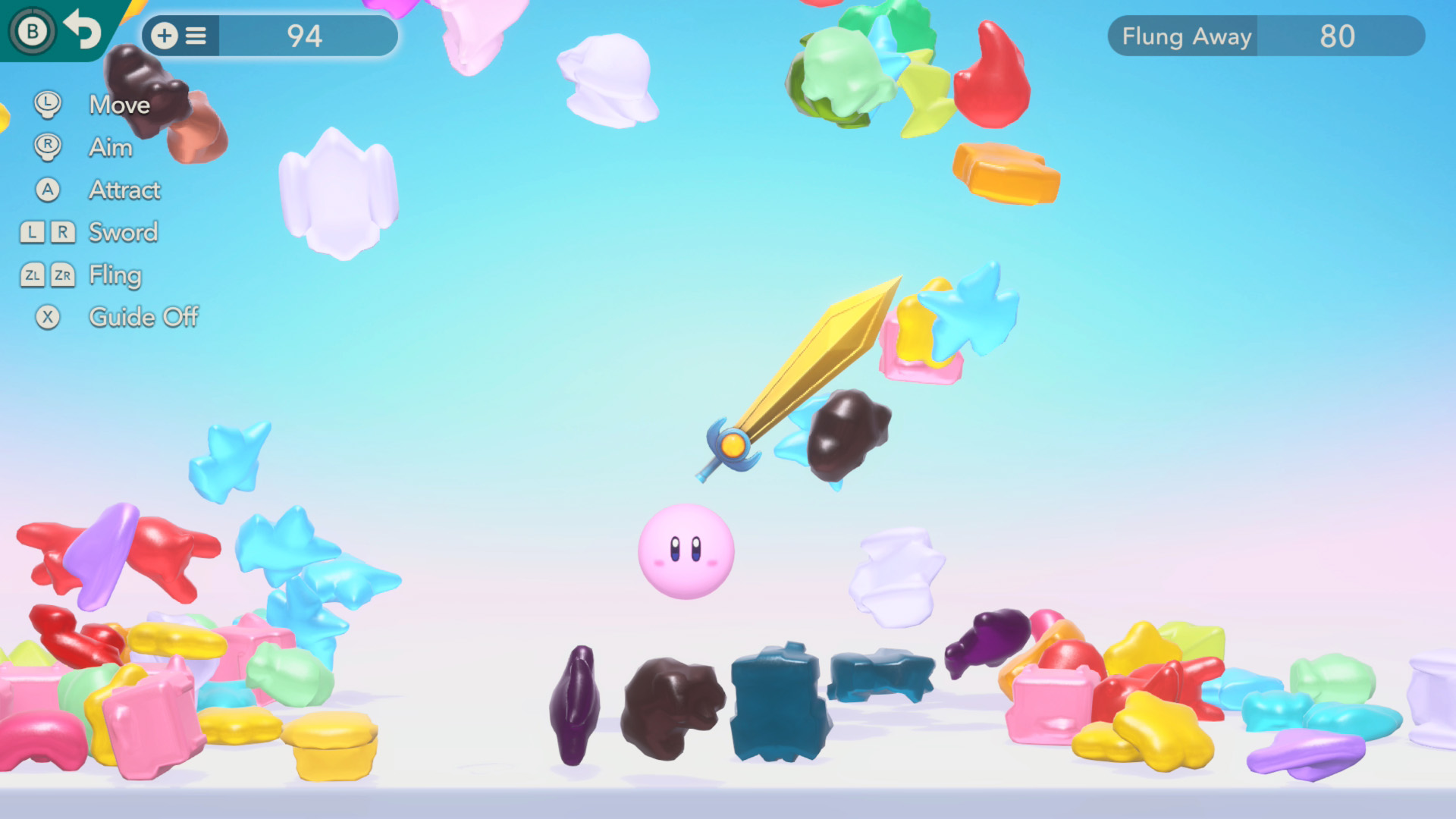 A game scene featuring Kirby surrounded by colorful objects, a golden sword above, and UI elements showing 'Move,' 'Aim,' 'Attract,' 'Sword,' 'Fling,' 'Guide Off,' a score of 94, and 'Flung Away 80'.