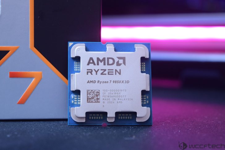 An AMD Ryzen 7 9850X3D processor is displayed next to its packaging, featuring visible branding and model number details.
