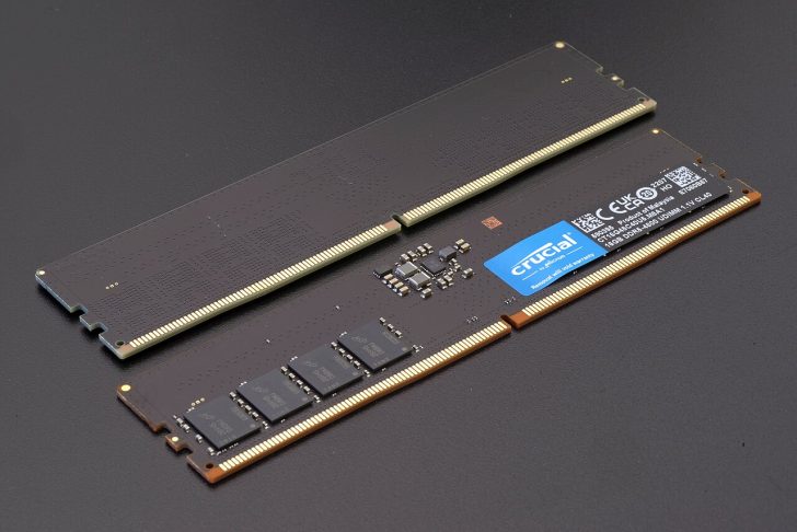 A pair of Crucial RAM sticks labeled as 16GB DDR5-4800 UDIMM, displaying memory chips and circuit details.