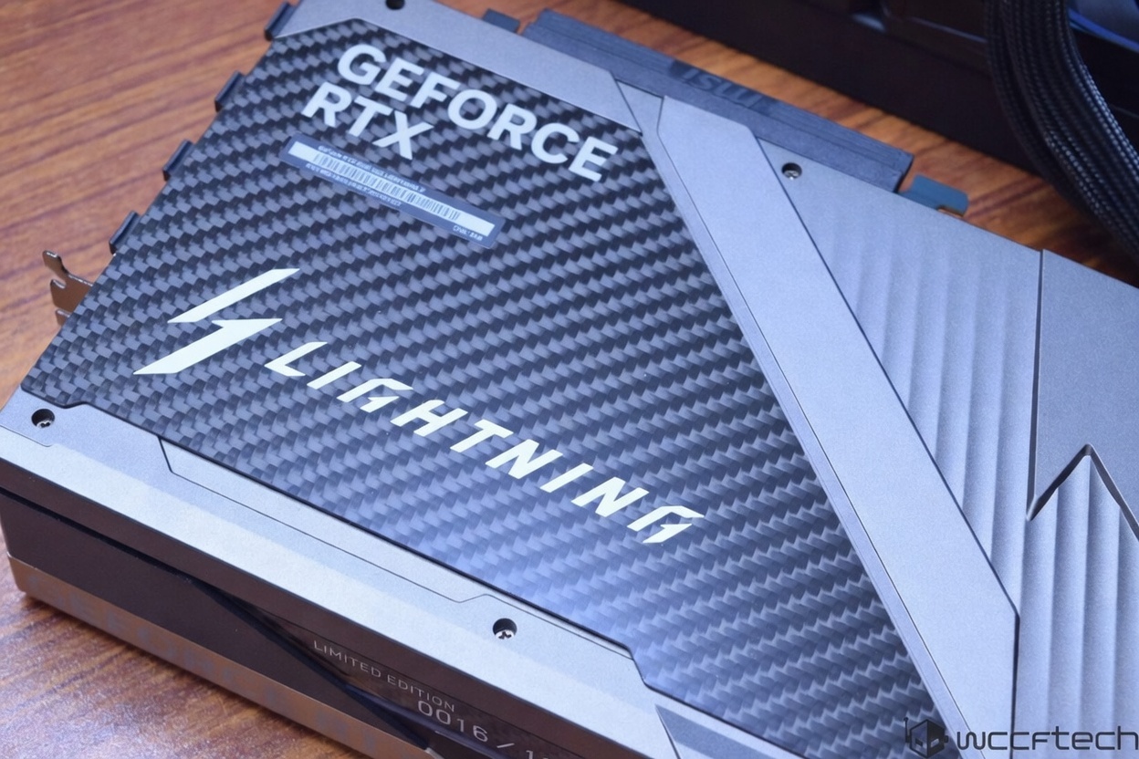 A close-up of an MSI GeForce RTX graphics card with 'LIGHTNING' branding and carbon fiber detailing.