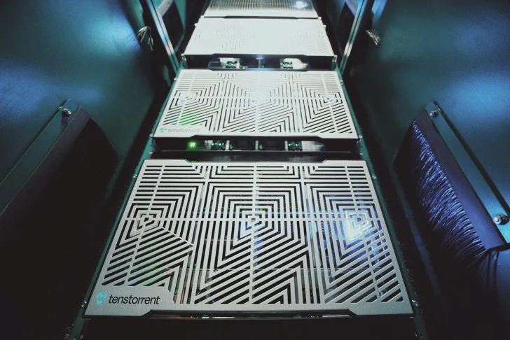 Several Tenstorrent server units are installed in a data center rack, displaying intricate geometric vent designs with visible green LED indicators.