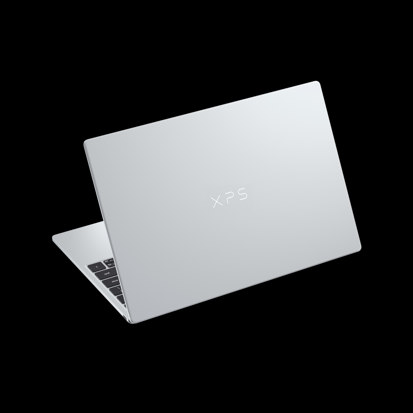 A silver Dell XPS laptop is partially open, displaying the 'XPS' logo on the lid against a black background.