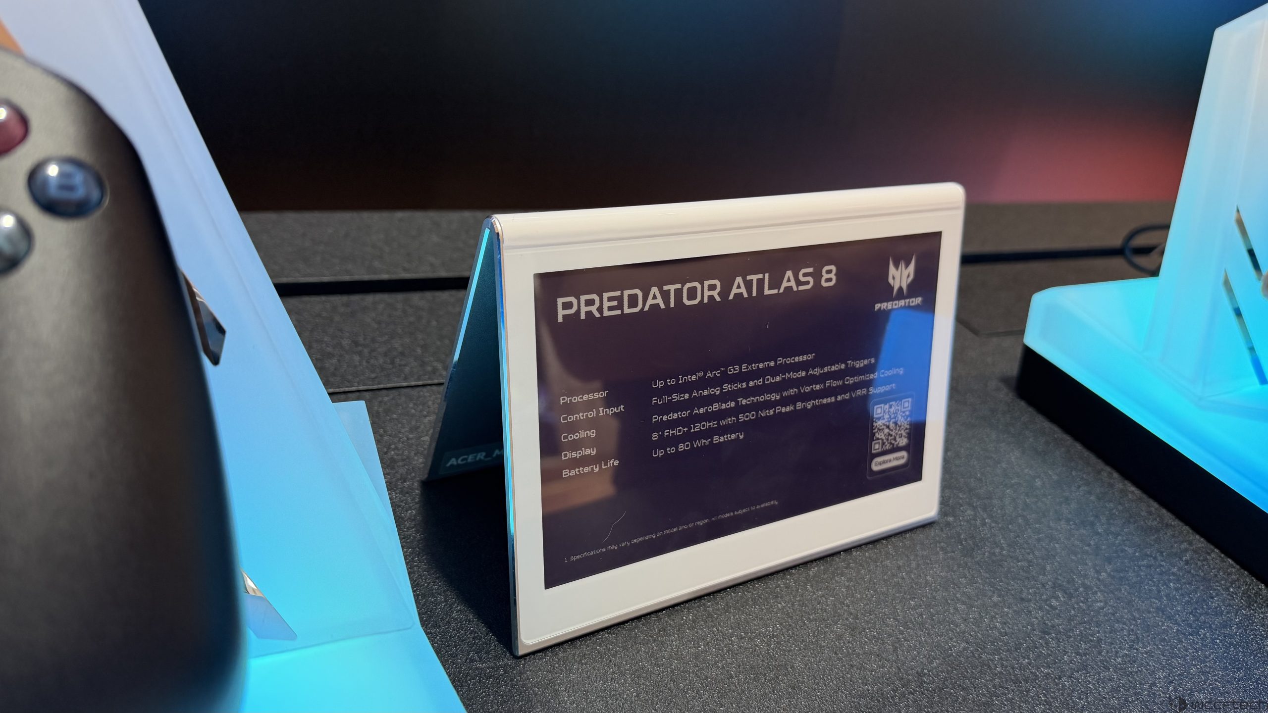 A promotional display for the Predator Atlas 8 shows specs including Up to Intel Arc G3 Extreme Processor and 8” FHD+ 120Hz display with 500 nits peak brightness.