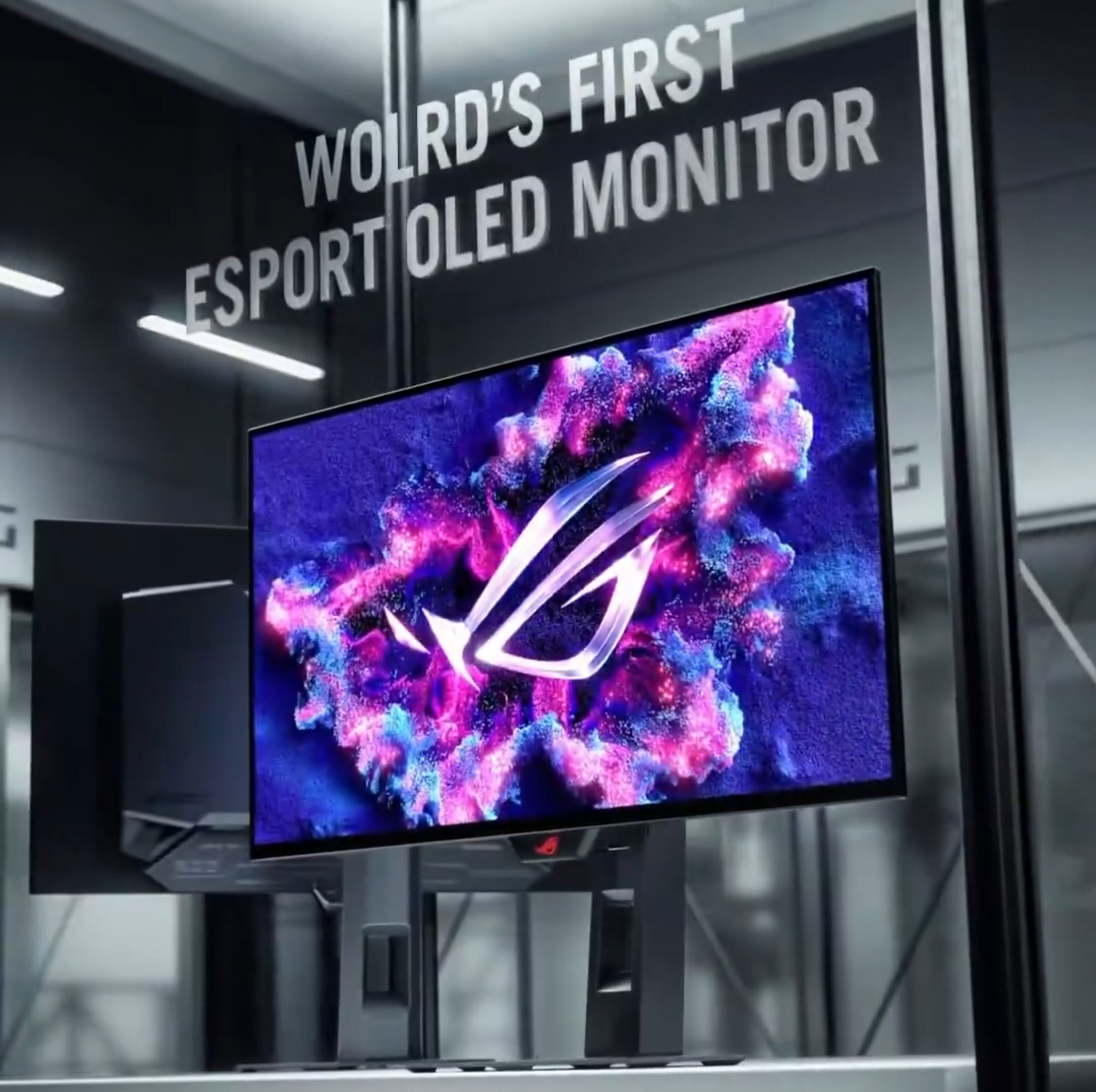 An ASUS ROG monitor is displayed with vibrant visuals, and text above it reads 'World's First Esports OLED Monitor'.