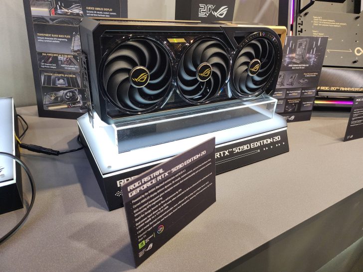 An ASUS ROG Astral GeForce RTX 5090 Edition 20 graphics card is displayed on a stand.