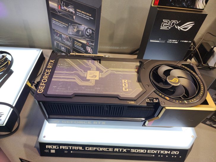 The image shows an ASUS ROG Astral GeForce RTX 5090 Edition 20 graphics card displayed on a stand.