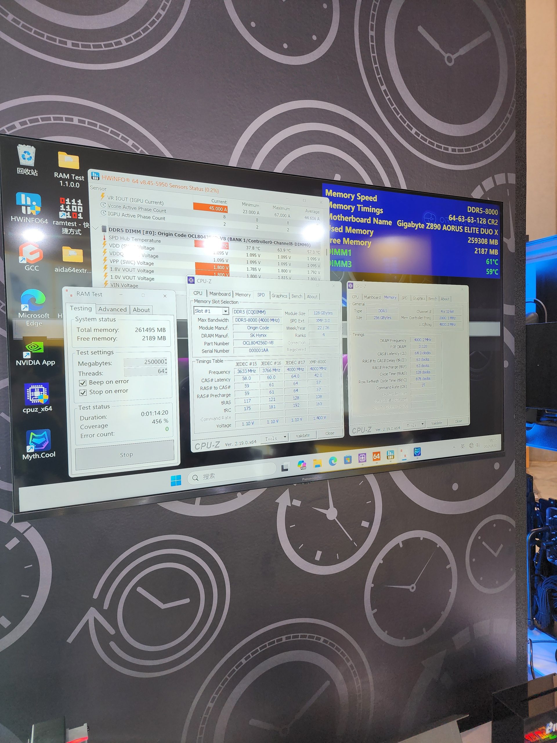 A monitor displays hardware monitoring software with 'HWiNFO64' and 'CPU-Z' running on a Gigabyte Z690 AORUS ELITE DDR5 system showing a memory speed of DDR5-8000.