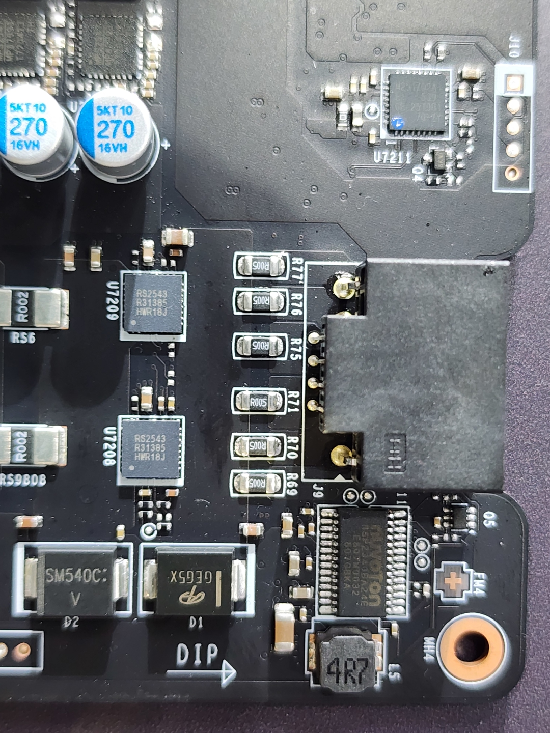 Close-up of a circuit board showing Samsung capacitors labeled '5KT10 270 16VH' and an Infineon chip with the designation '6EDL04N02E.'