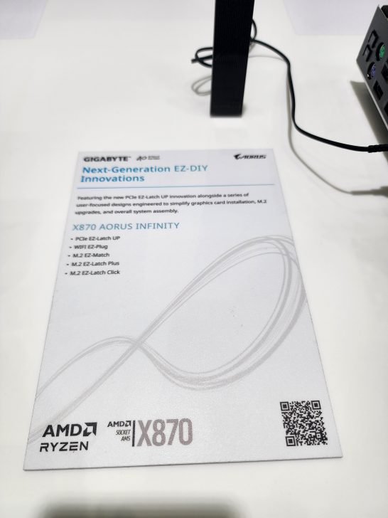 A GIGABYTE brochure titled 'Next-Generation EZ-DIY Innovations' describes features of the X870 AORUS Infinity with AMD Ryzen, including PCIe EZ-Latch UP and WiFi EZ-Plug.