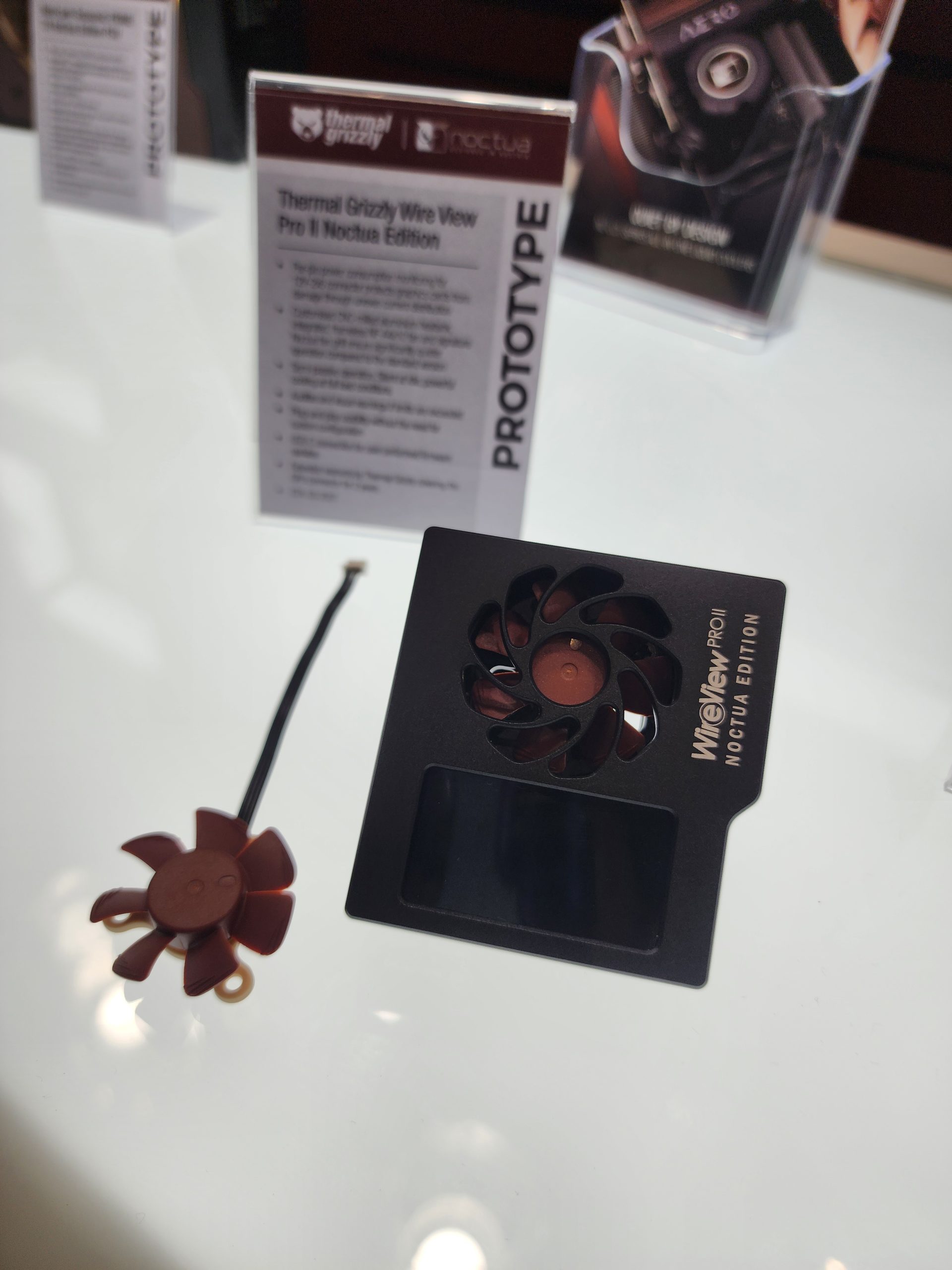 A display showcases the Thermal Grizzly Wire View Pro II Noctua Edition prototype with visible branding and text.
