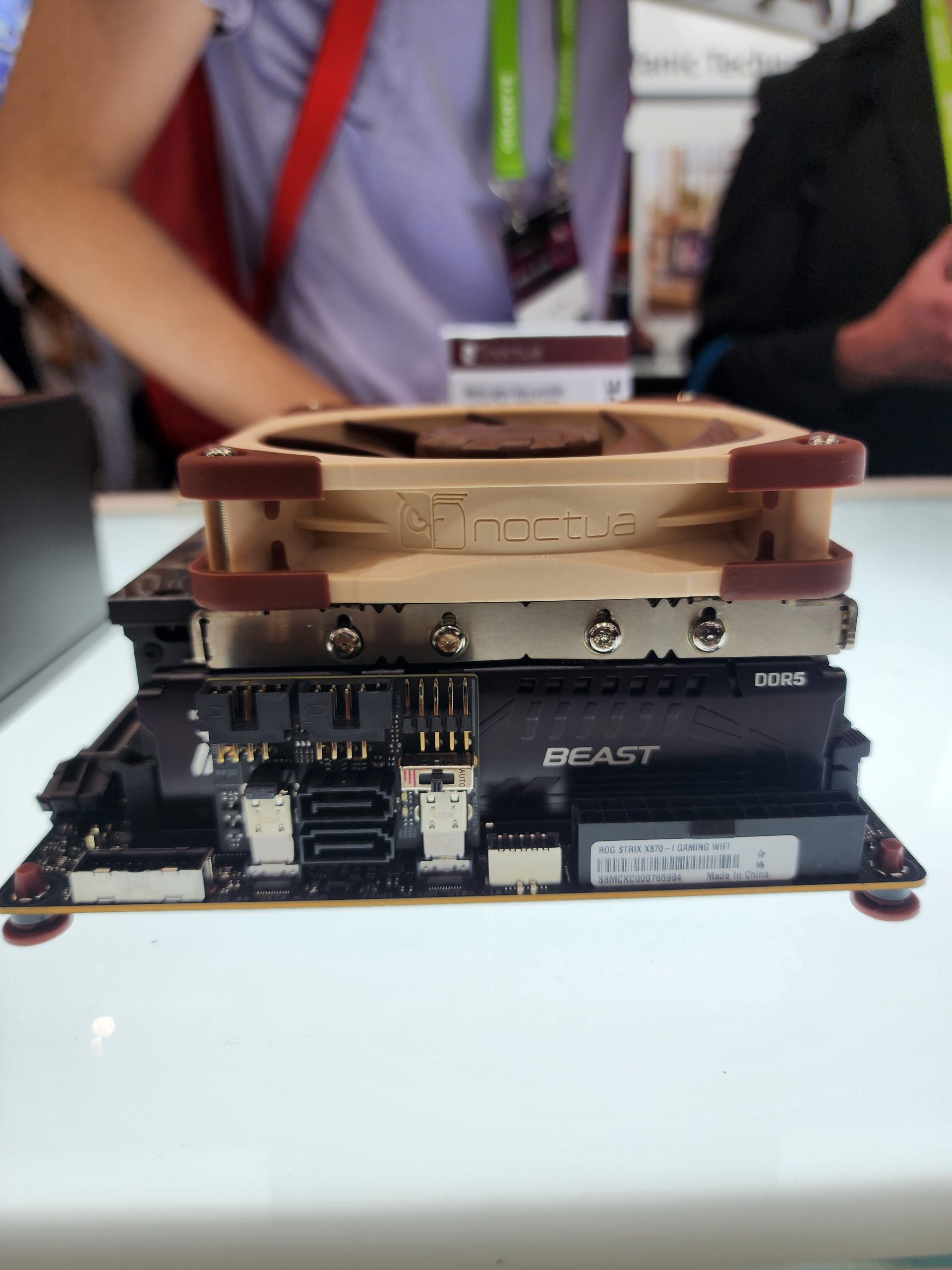 A Noctua CPU cooler sits atop a Kingston Fury Beast DDR5 memory module on an ASUS ROG Strix X670-I Gaming WiFi motherboard.