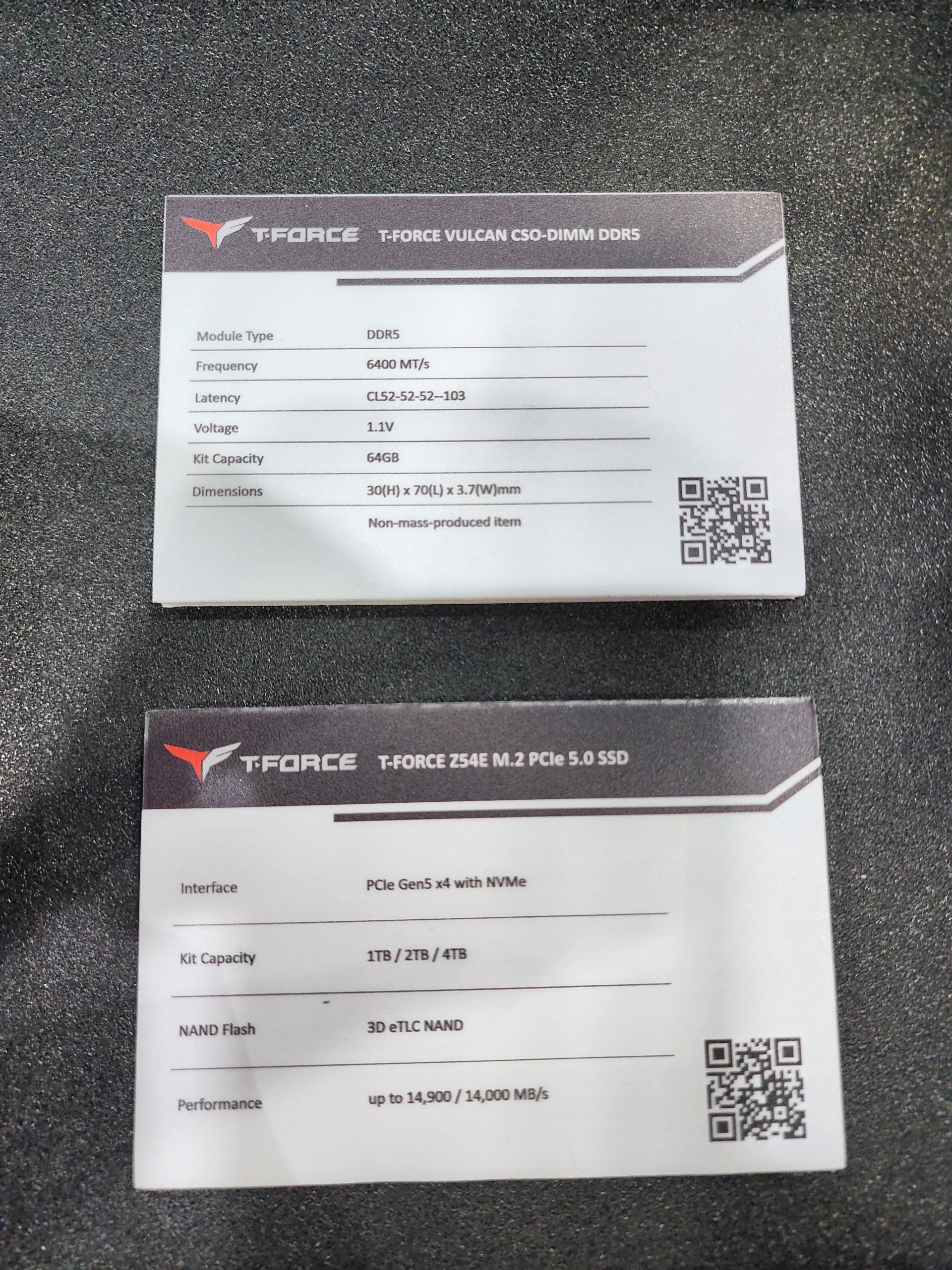 Two product specification cards display details for the T-Force Vulcan CSO-DIMM DDR5 and the T-Force Z54E M.2 PCIe 5.0 SSD, highlighting features such as DDR5 memory with 6400 MT/s frequency and PCIe Gen5 x4 interface with up to 14,900 MB/s performance.