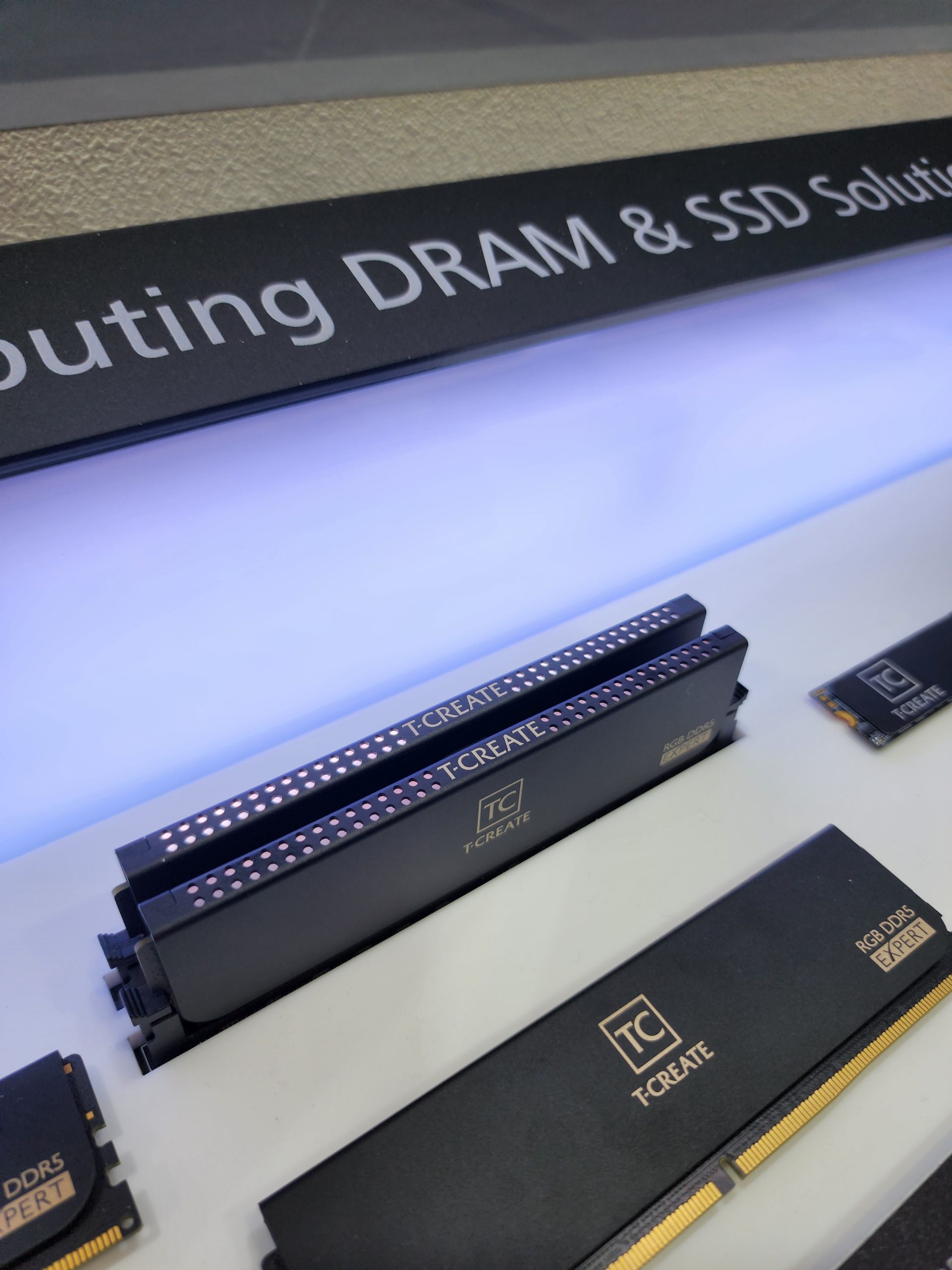 T-CREATE RGB DDR5 Expert memory modules are displayed on a lit surface with the text 'Computing DRAM & SSD Solutions' in the background.