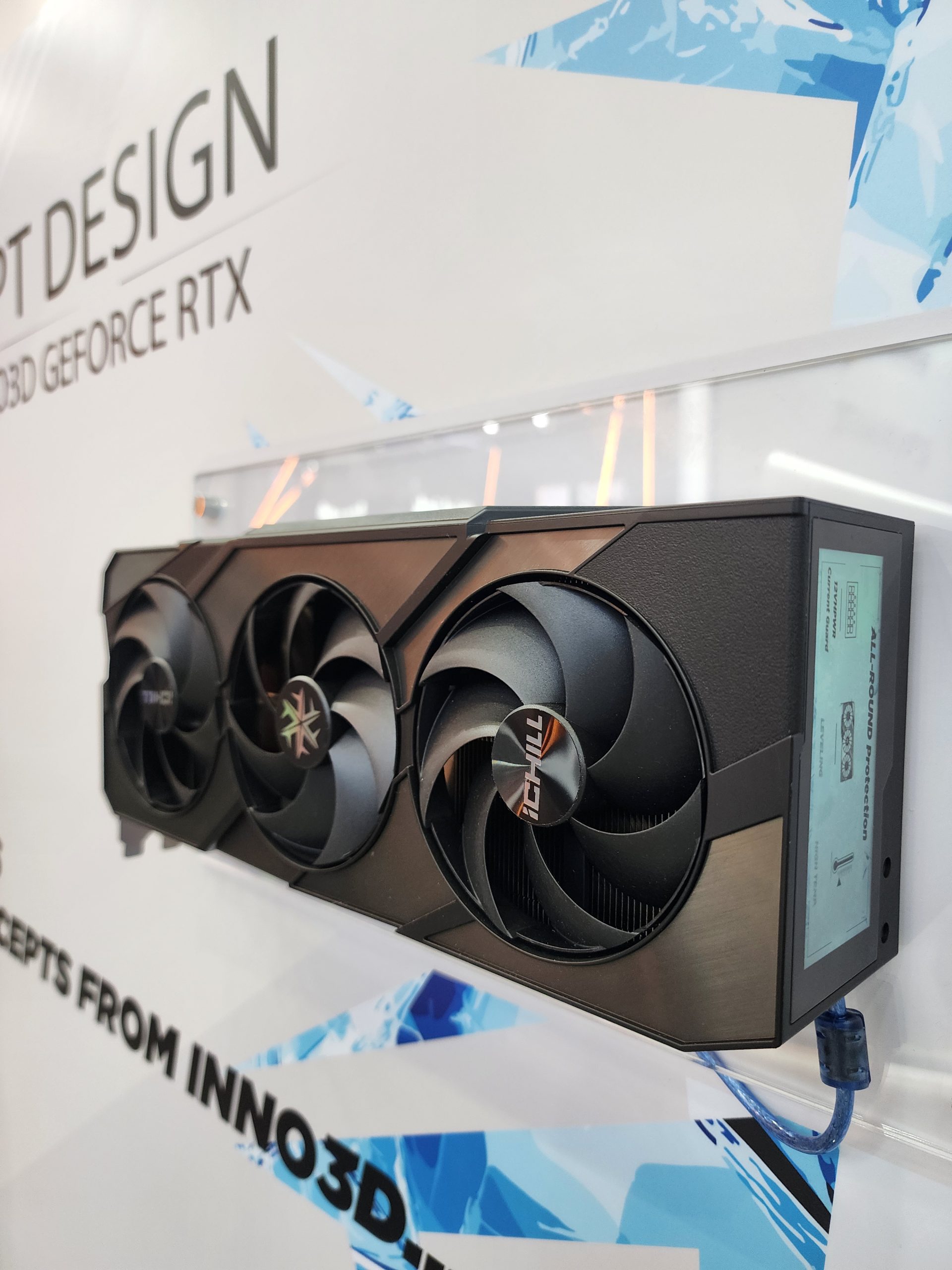 An Inno3D GeForce RTX graphics card with 'iChill' branding is displayed on a wall labeled 'CONCEPT DESIGN INNO3D GEFORCE RTX'.