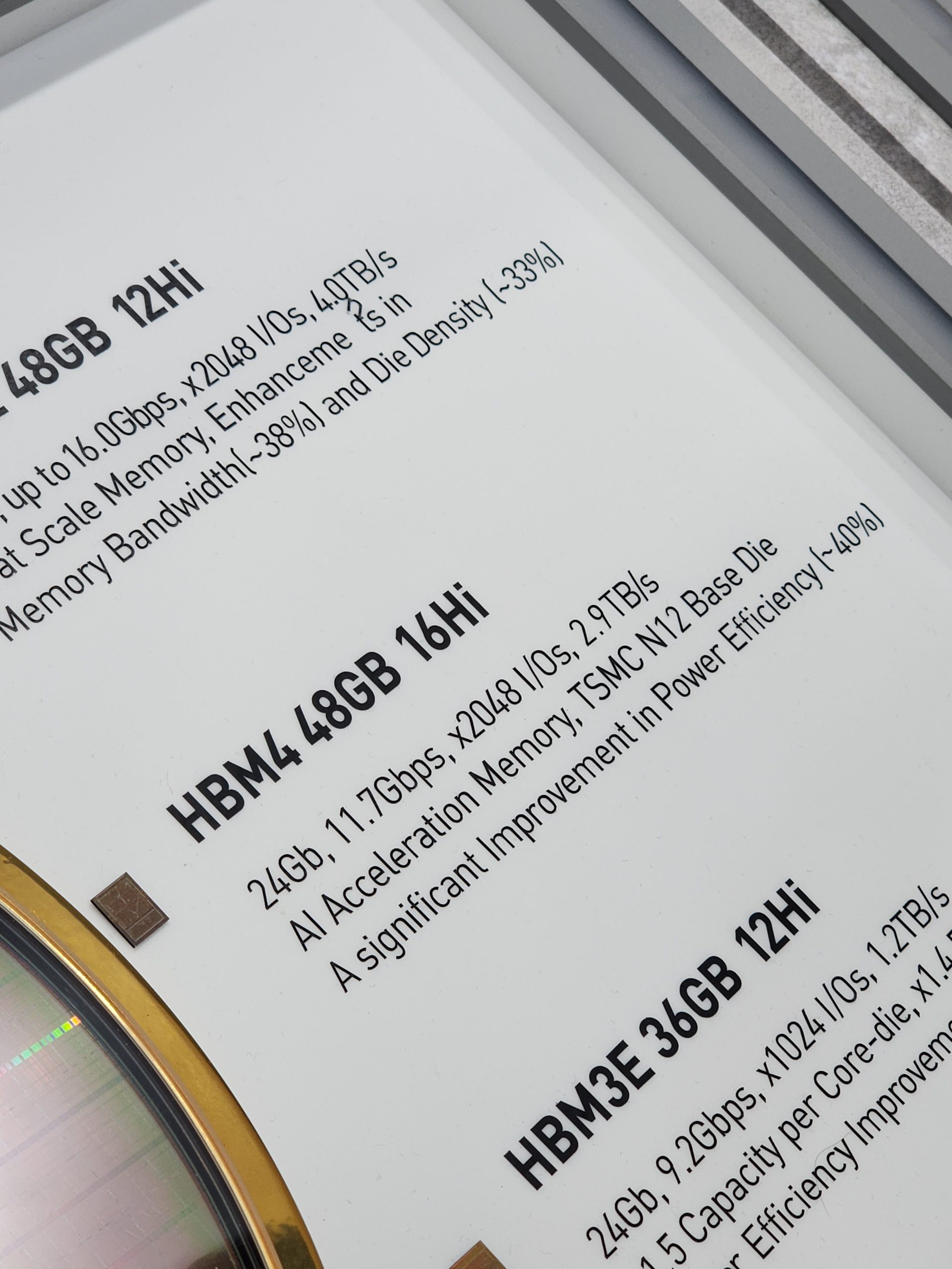 A close-up of a presentation slide displaying specifications for 'HBM3E 36GB 12Hi', 'HBM 48GB 16Hi', and another model, highlighting AI acceleration memory and improvements in power efficiency and die density.