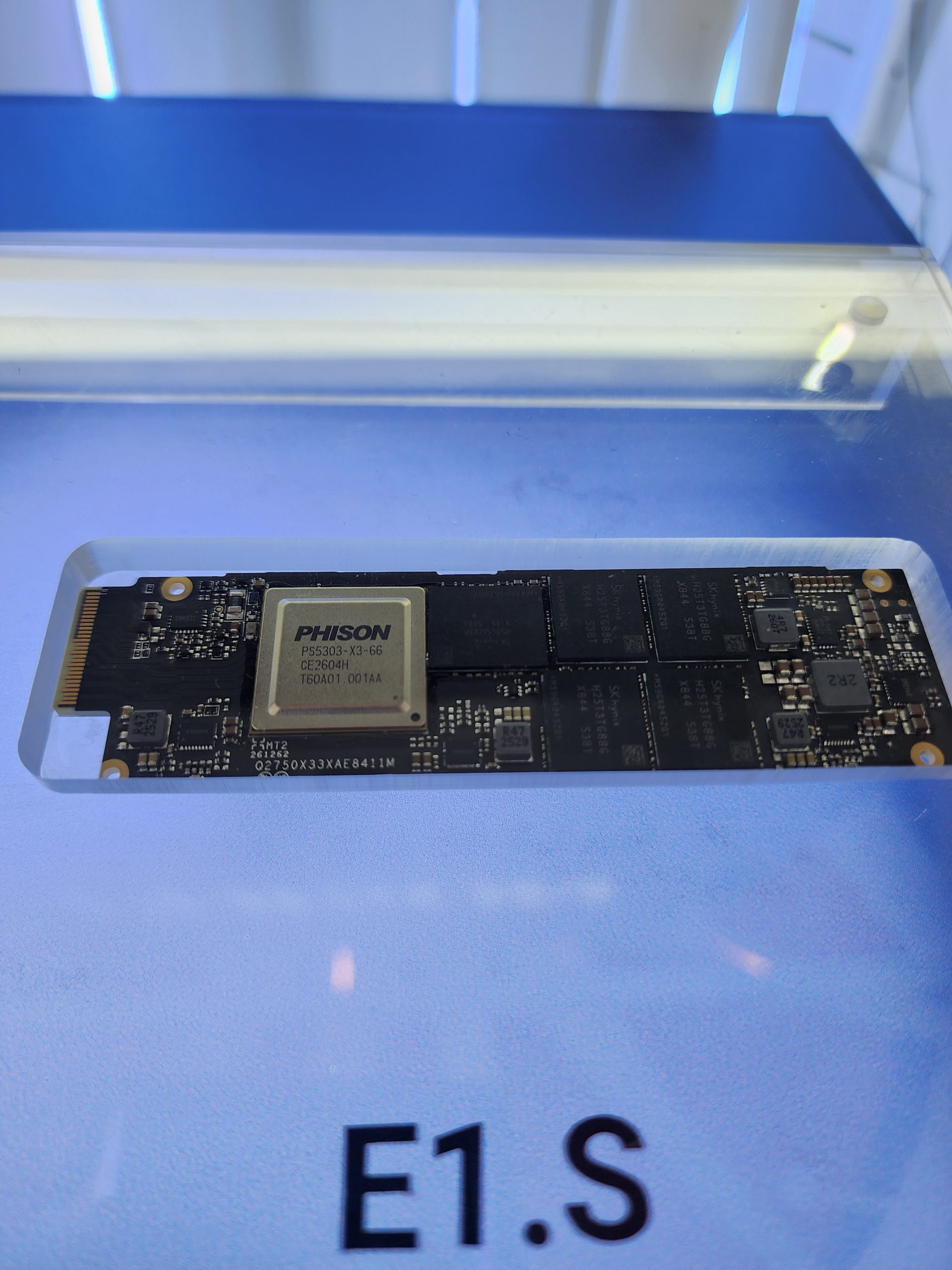 A Phison PS5033-X3-G6 chip displayed on a circuit board labeled 'E1.S'.