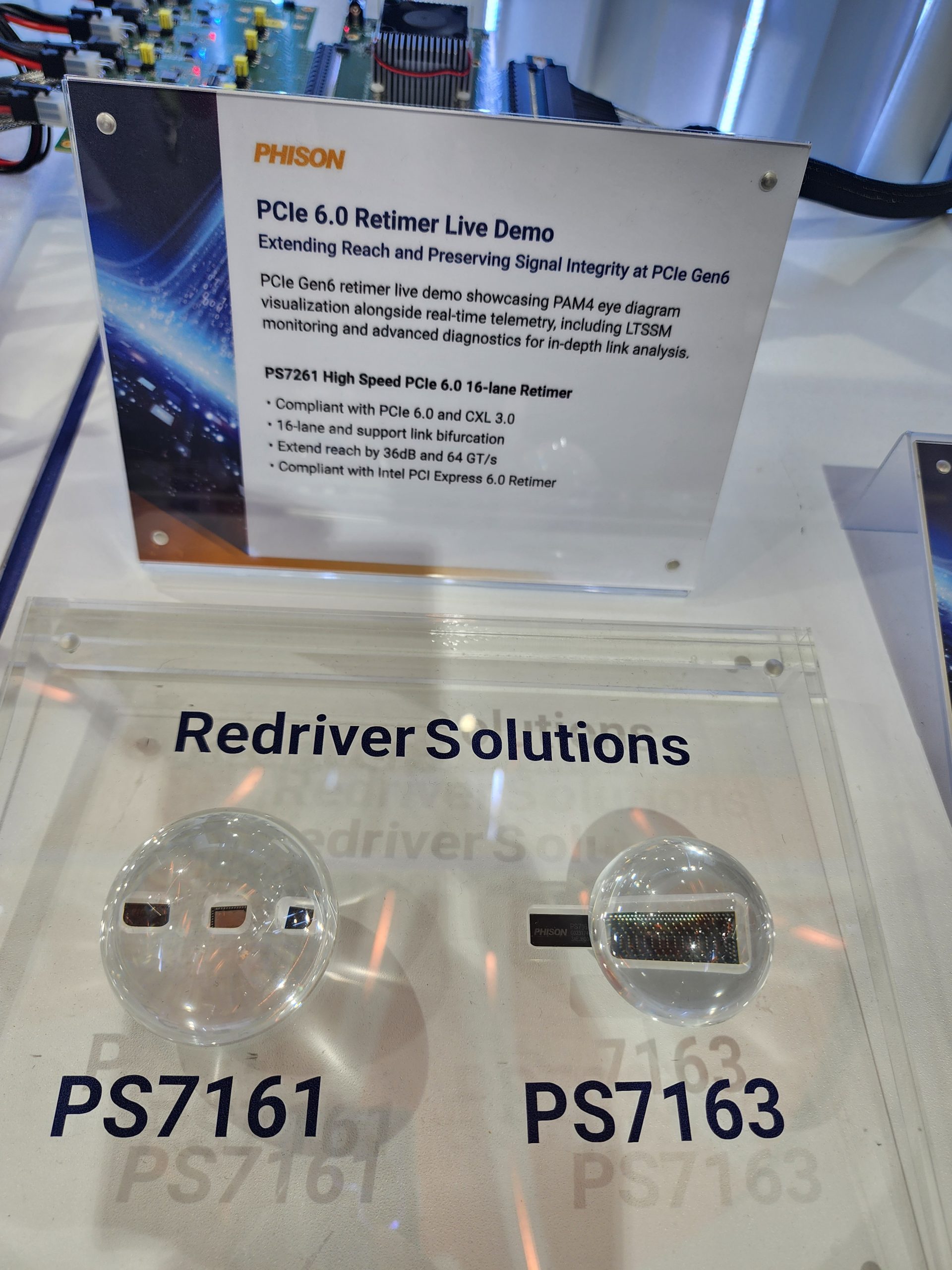 A display featuring Phison's 'PCIe 6.0 Retimer Live Demo' and 'Redriver Solutions' for models PS7161 and PS7163, highlighting their compliance with PCIe 6.0 and CXL 3.0 standards.