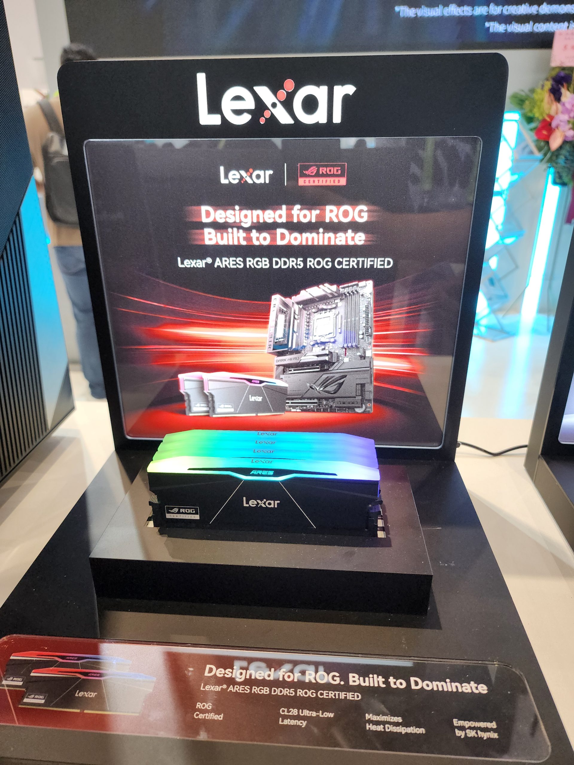Lexar ARES RGB DDR5 memory labeled 'Designed for ROG Built to Dominate' is displayed with RGB lighting and ROG certification branding.
