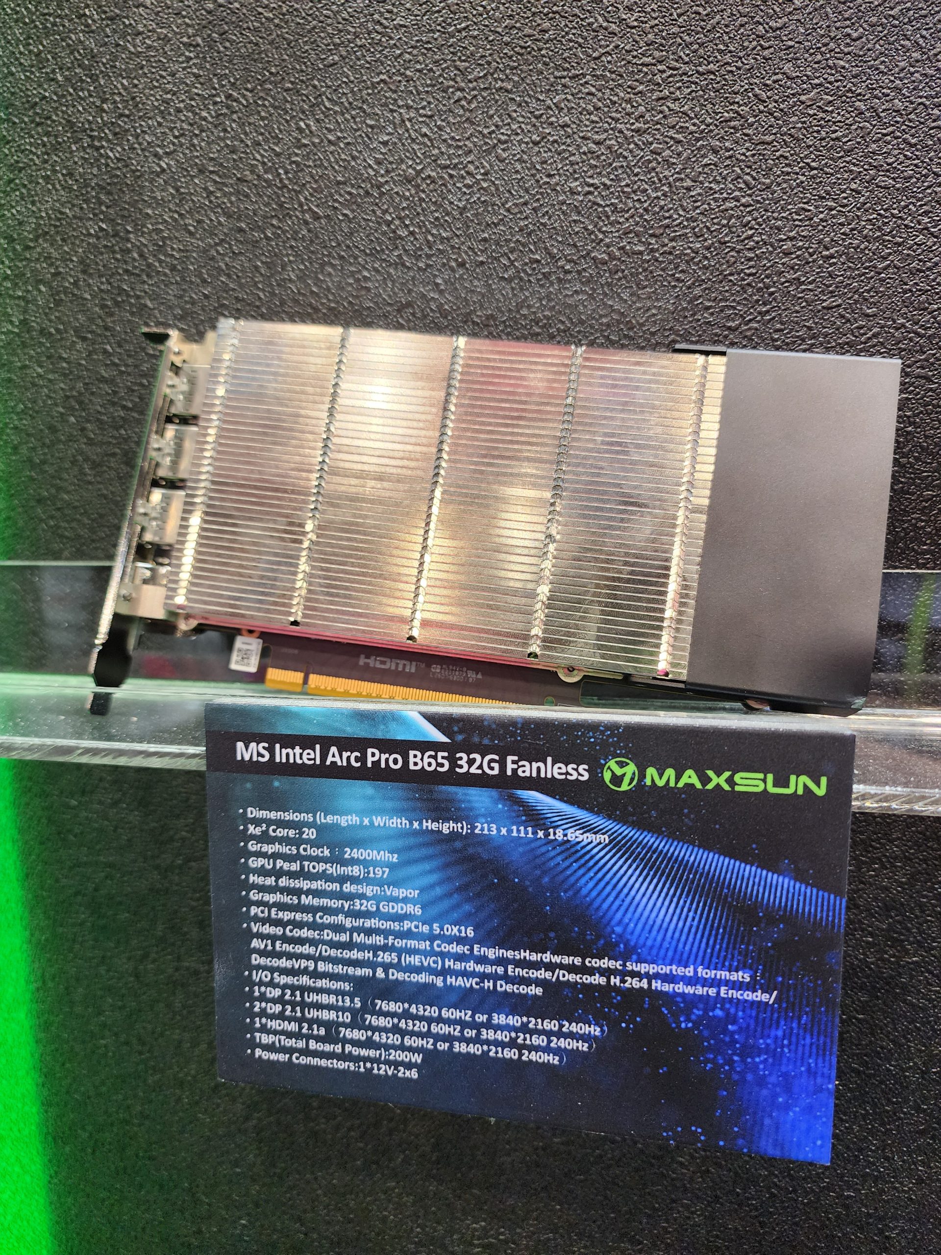 MS Intel Arc Pro B65 32G Fanless graphics card by MaxSun is displayed with specs detailing a 2400MHz graphics clock and 32GB GDDR6 memory.