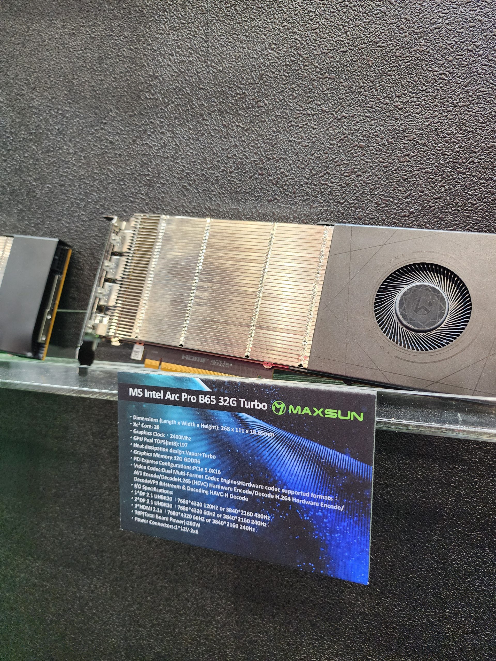 Maxsun's Intel Arc Pro B65 32G Turbo graphics card is shown with specifications, including a clock speed of 2400 MHz, PCIe 5.0 x16 interface, and 32GB GDDR6 memory.