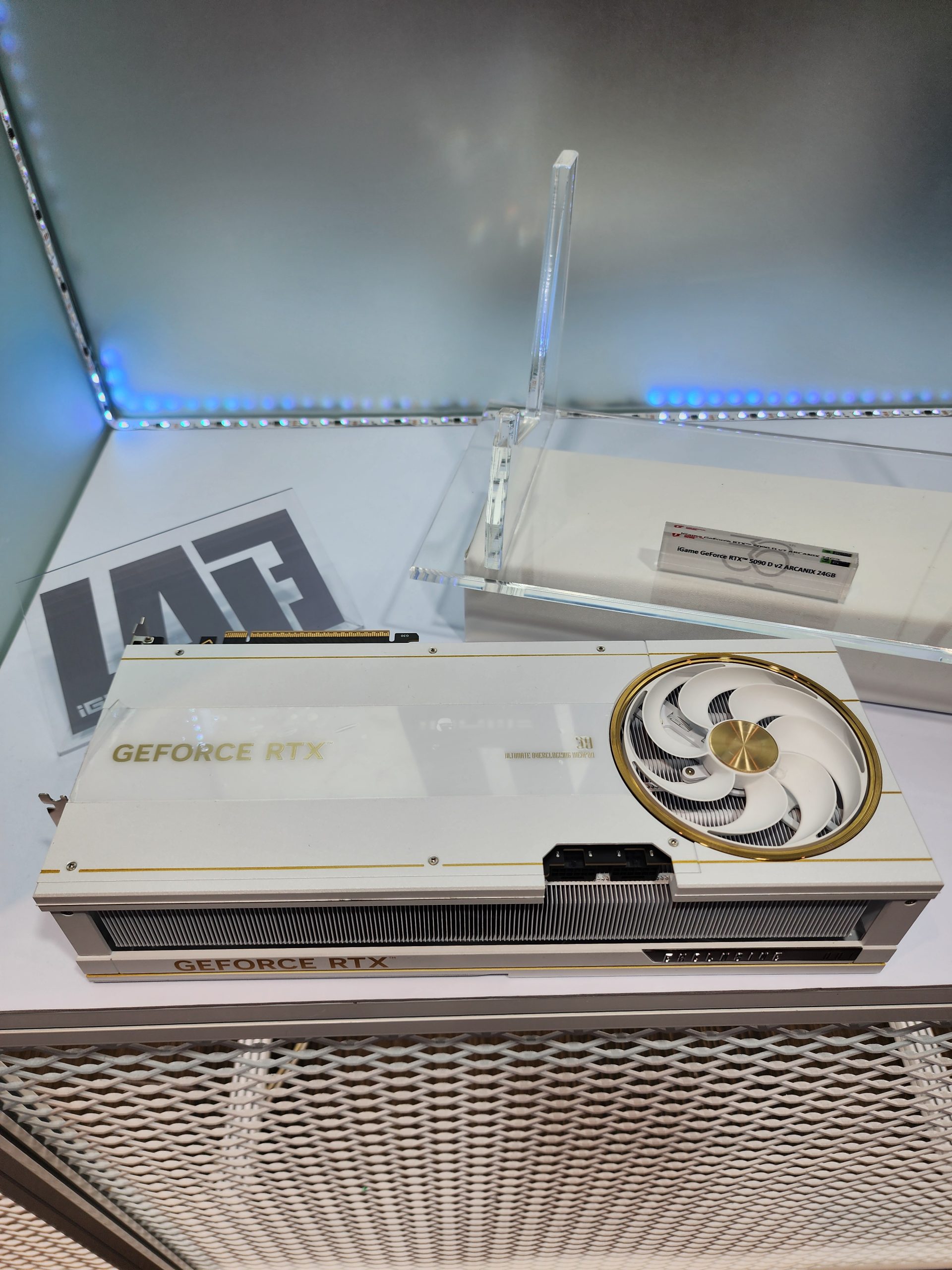 A GALAX GeForce RTX 4090 Boomstar White Edition graphics card is displayed with visible branding and a single cooling fan.