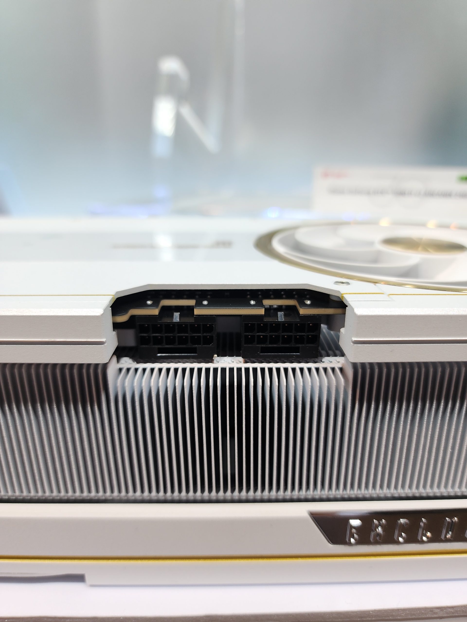 A close-up of a white graphics card with dual 8-pin power connectors and 'Colorful' branding visible on the side.