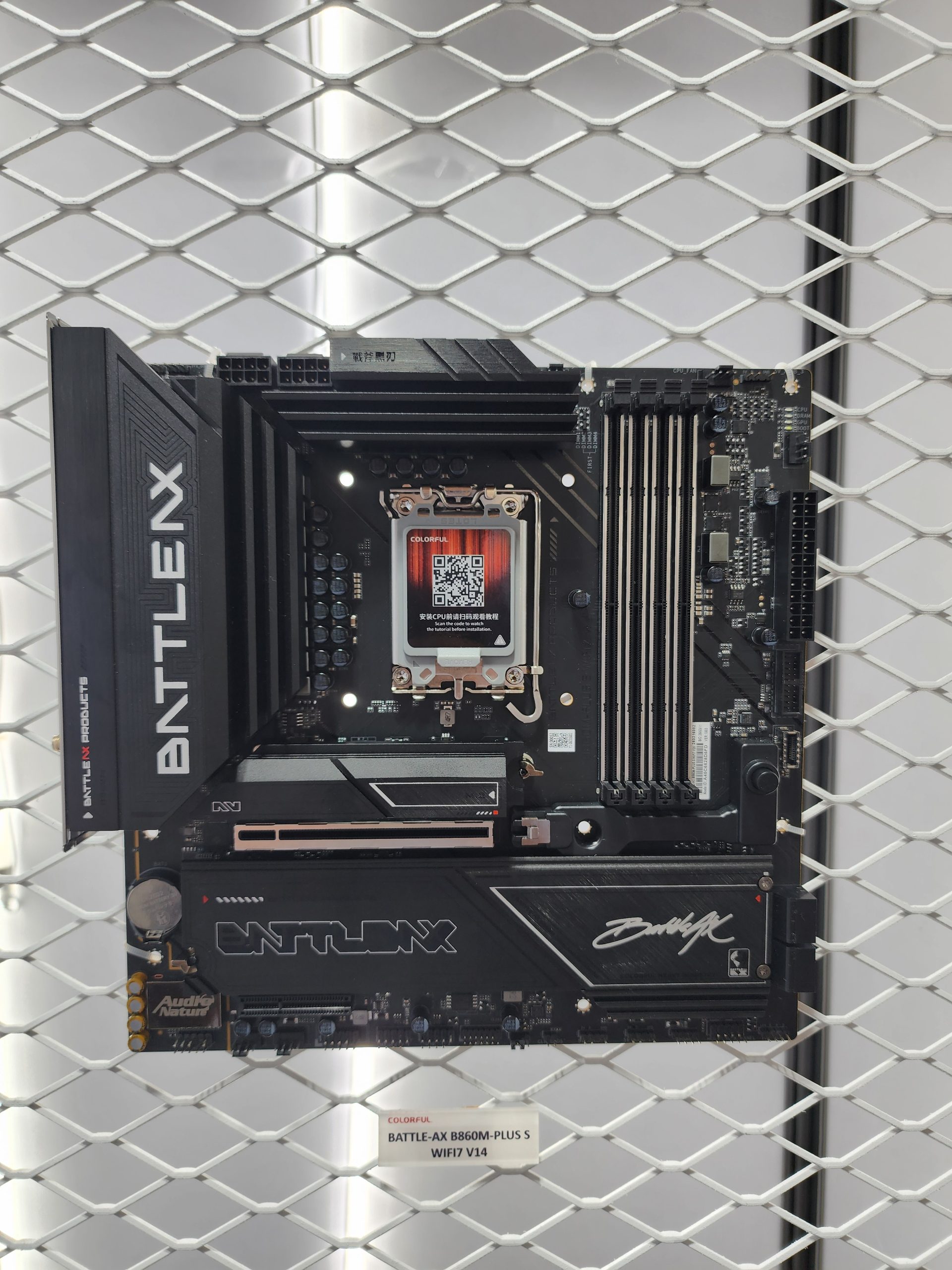A Colorful BATTLE-AX B860M-PLUS S WIFI7 V14 motherboard is displayed vertically against a grid pattern.