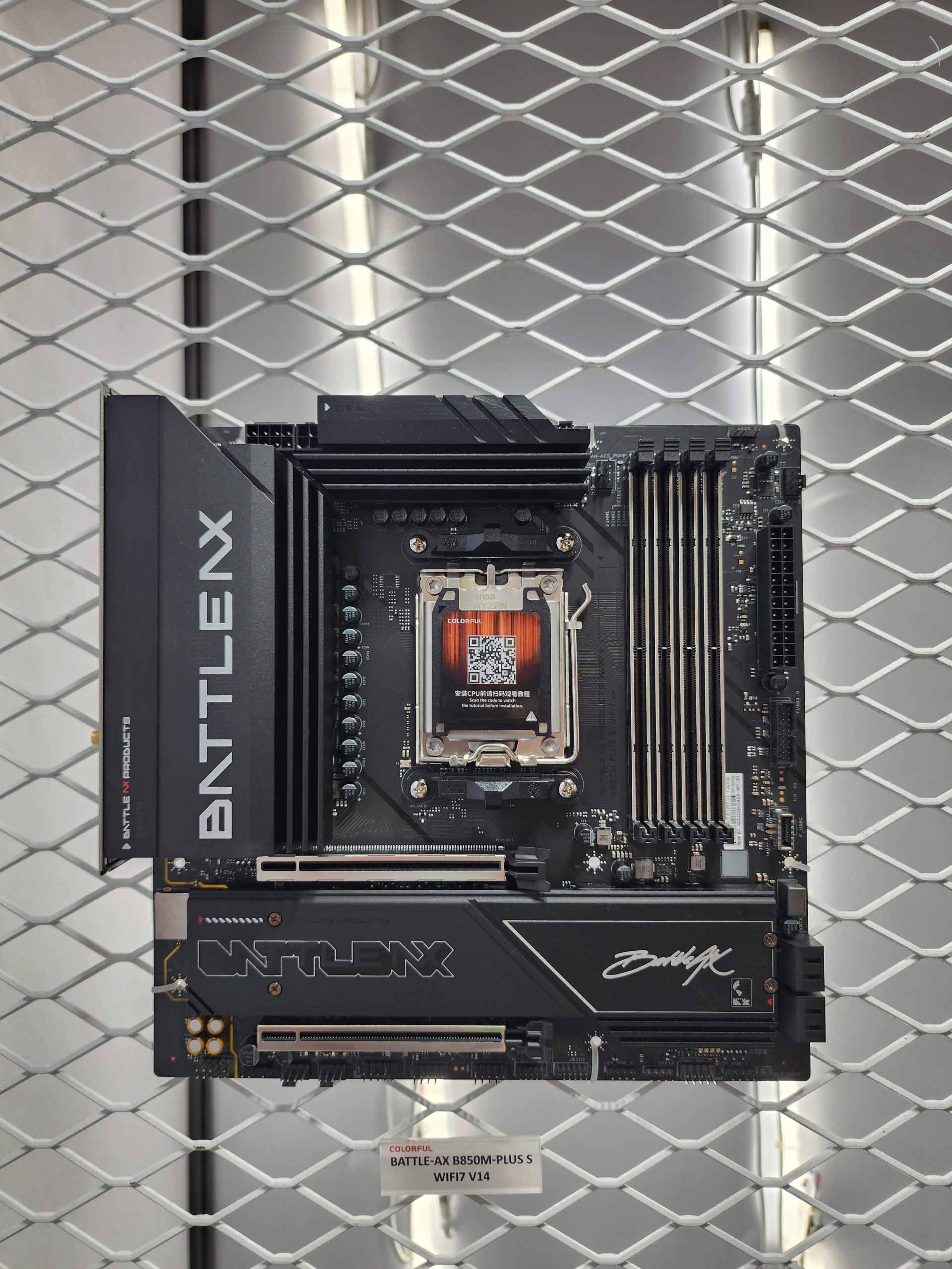 A Colorful BATTLE-AX B850M-PLUS S motherboard with visible branding and heat sink features is showcased against a mesh backdrop.