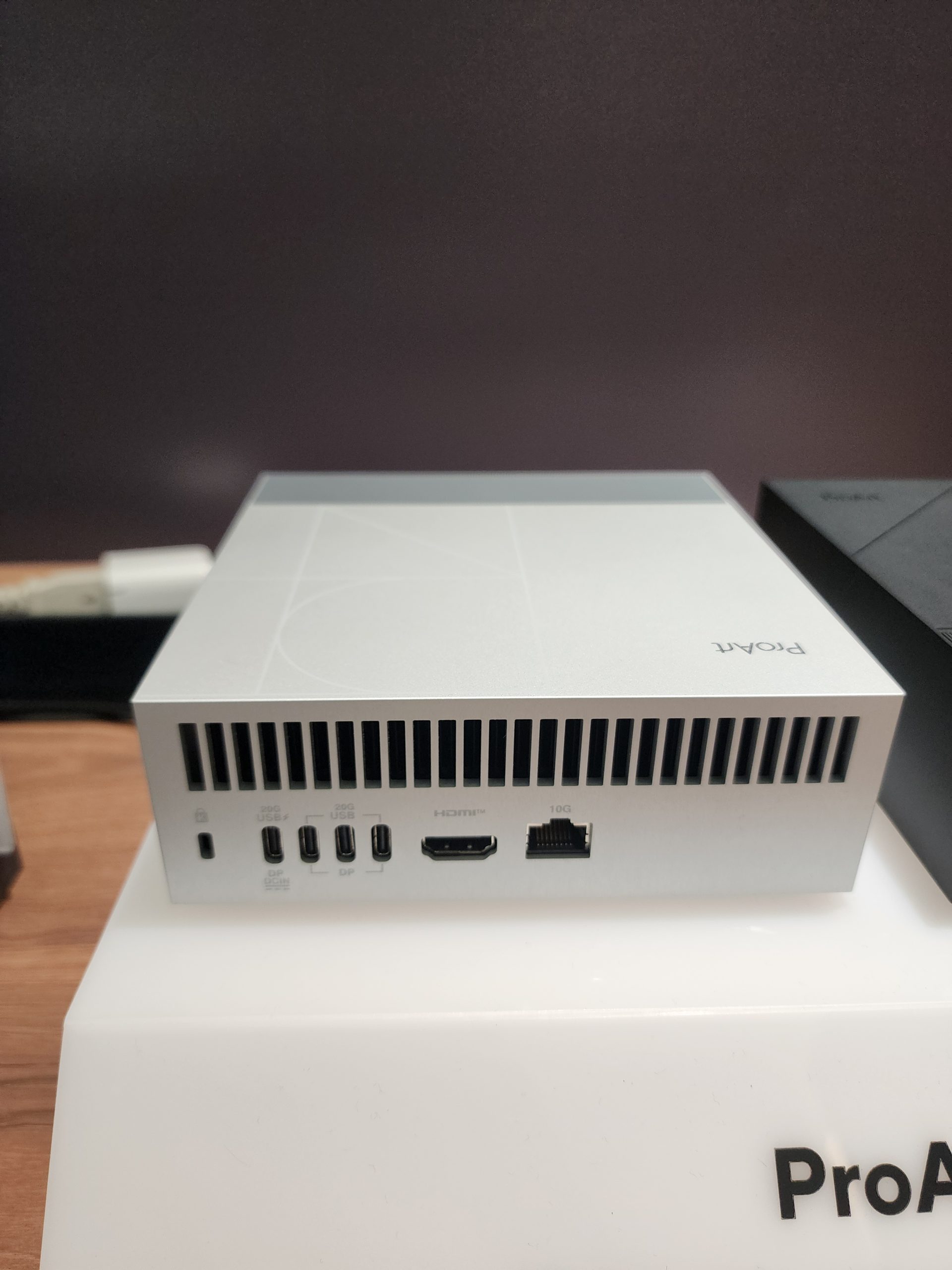 A ProArt device showcasing multiple rear ports including USB-C, HDMI, and Ethernet on a labelled stand.