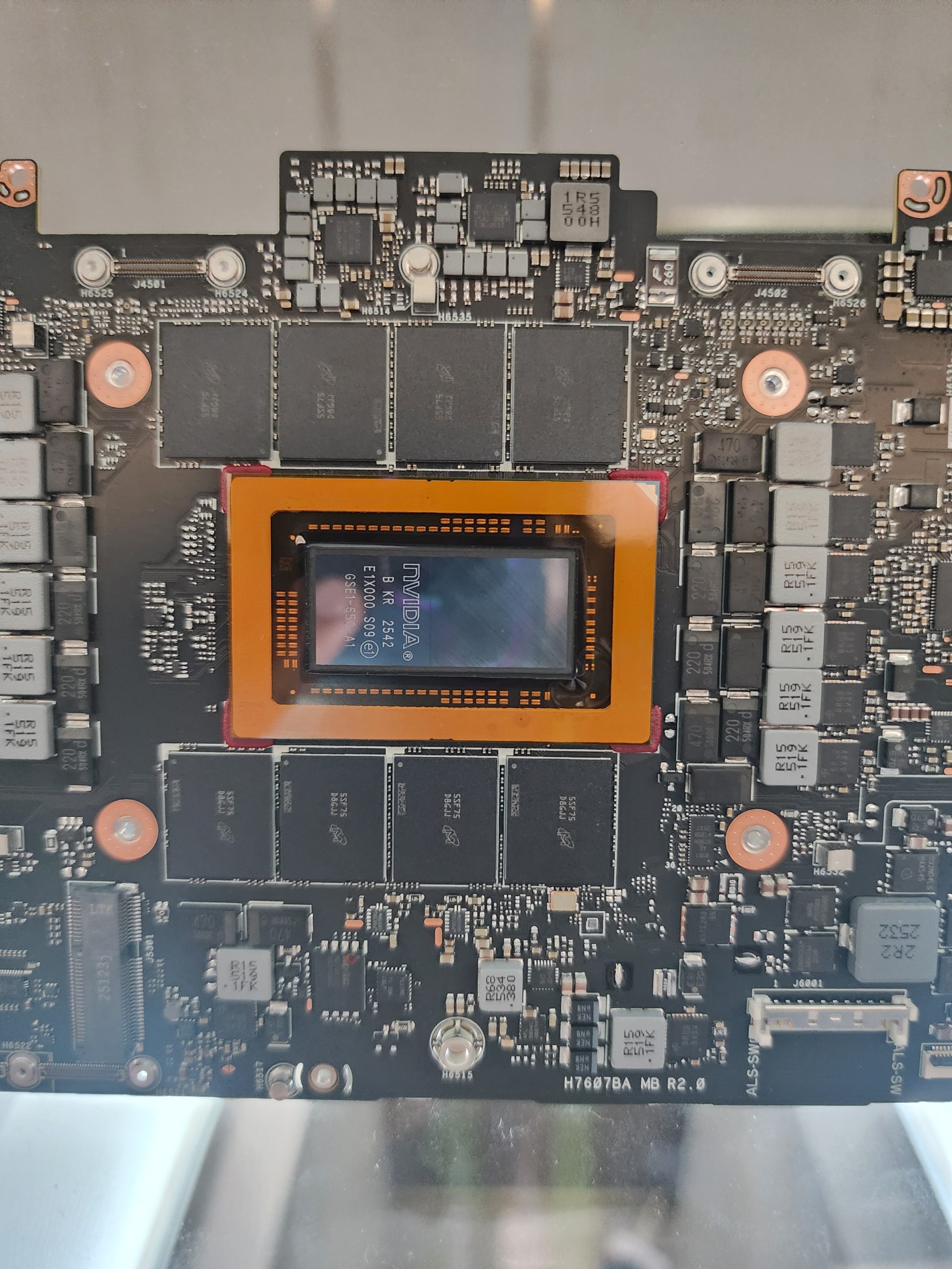 A close-up view of an NVIDIA GPU with the model number '10A2A5002-400-A1' visible on the chip, surrounded by memory modules on a circuit board.
