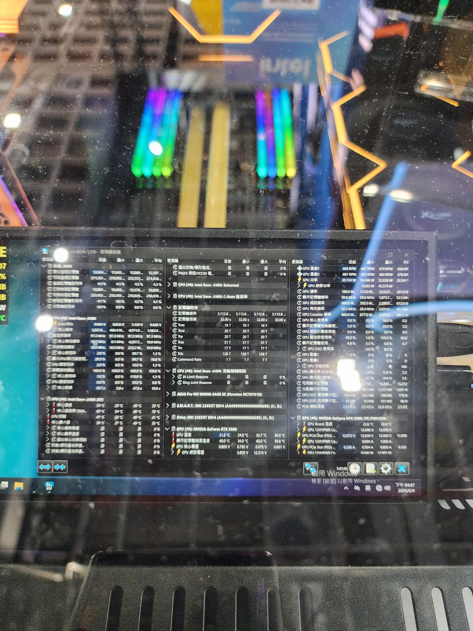 A computer screen displaying detailed hardware monitoring software lists components like the Intel Xeon-2400 and NVIDIA GeForce RTX 2080 under colorful RGB lighting.
