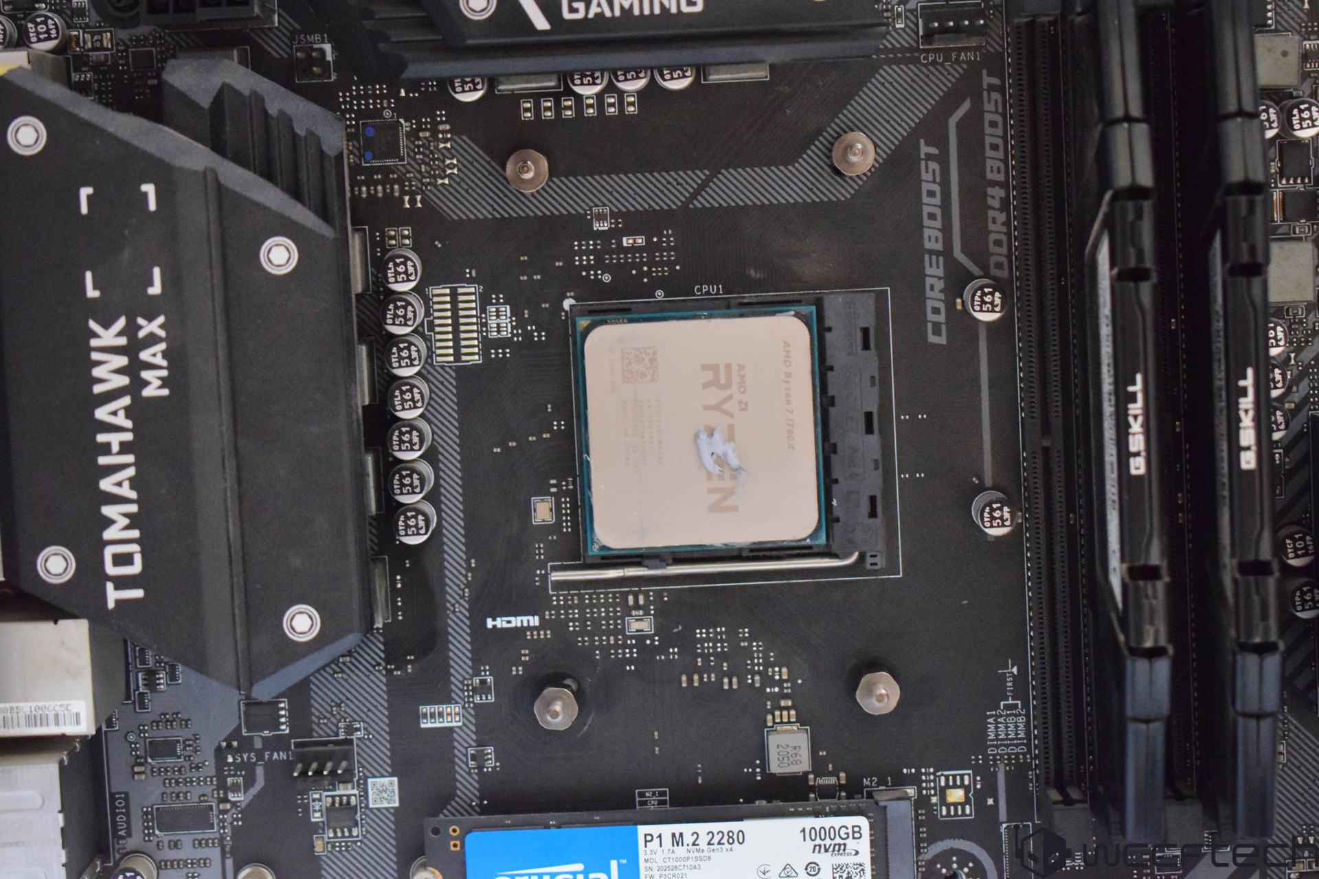 An AMD Ryzen processor installed on an MSI Tomahawk MAX motherboard with G.Skill RAM modules and a Crucial P1 M.2 2280 SSD.