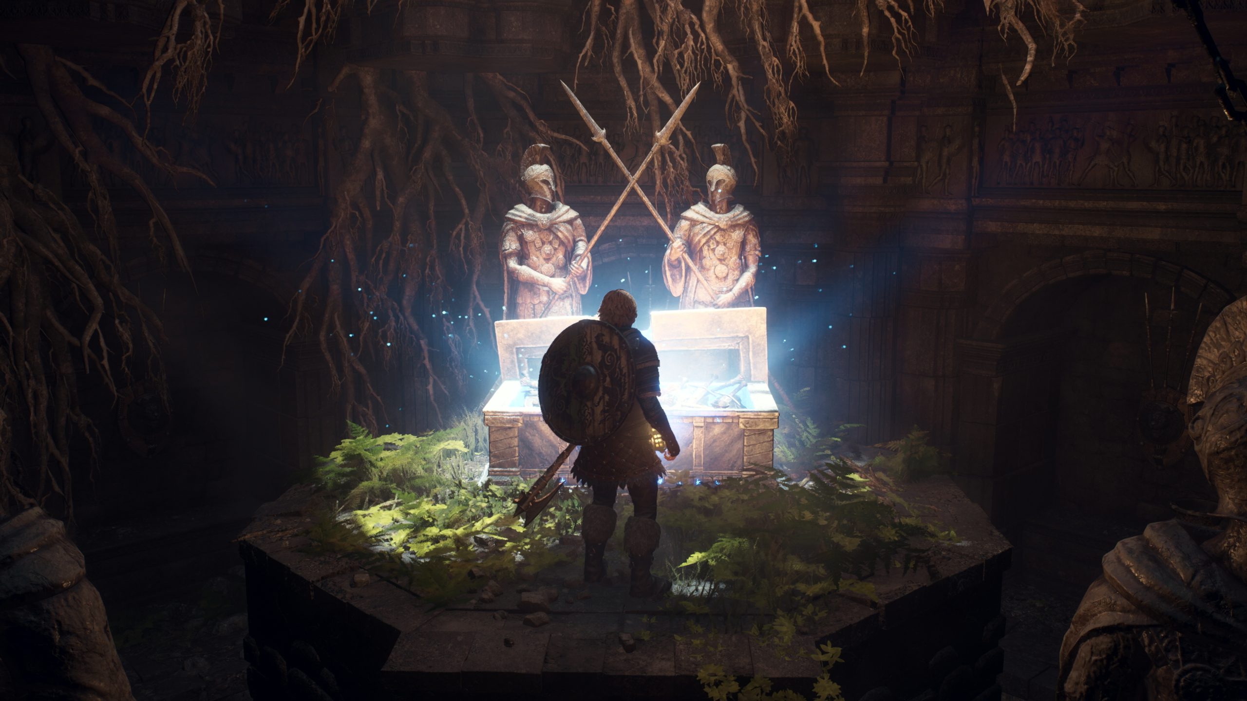 A character in 'Lies of P' stands before an open glowing chest in an ancient, root-filled chamber adorned with two statues holding spears.