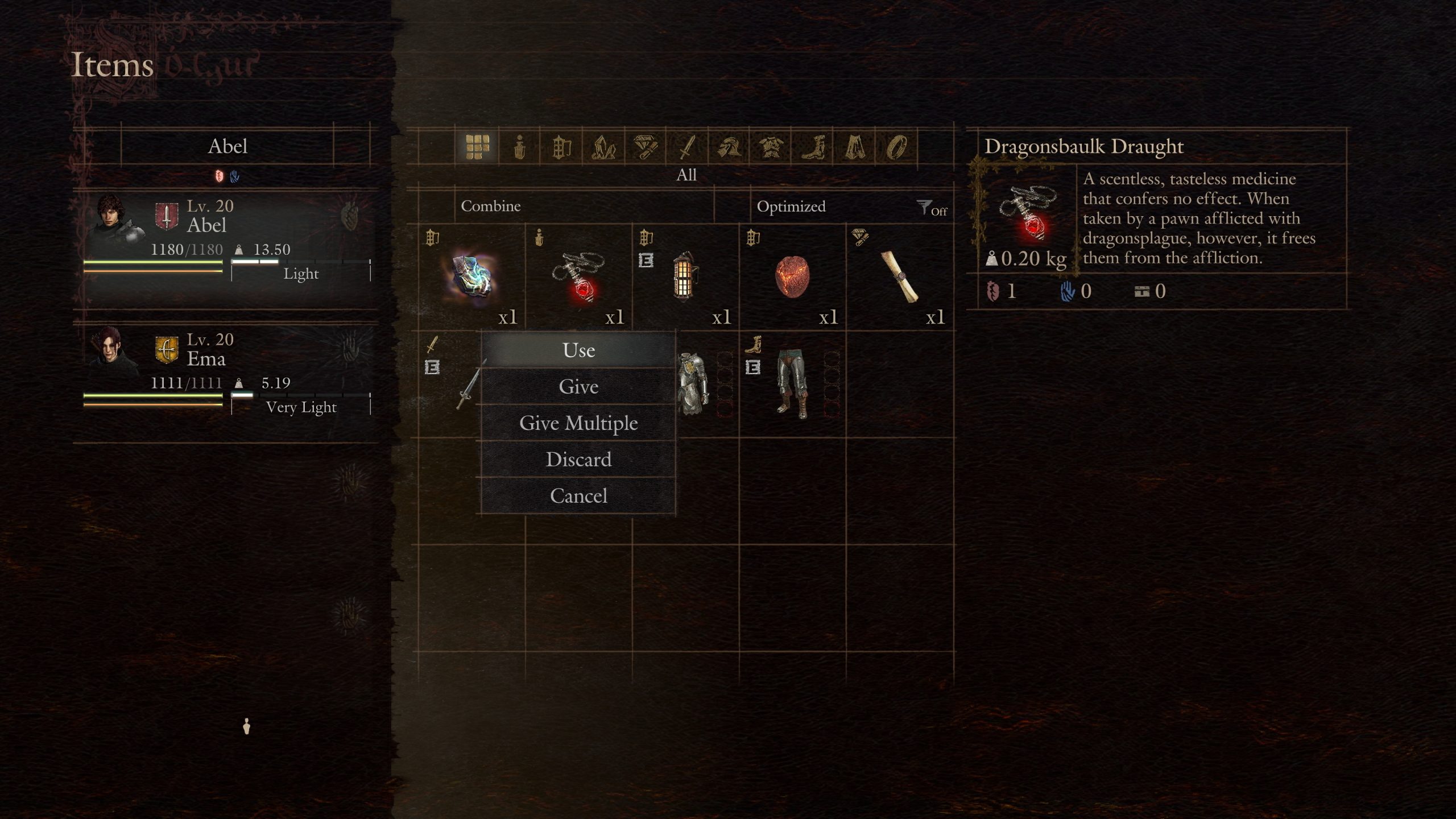 The in-game inventory screen from Dragon's Dogma shows characters Abel and Ema with various items including a Dragonsbaulk Draught and options to 'Use,' 'Give,' or 'Discard' an item.
