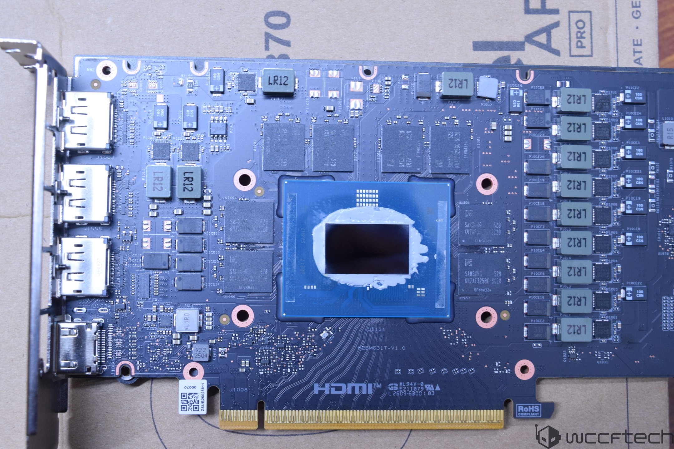 A close-up of a graphics card PCB showing exposed components with visible 'HDMI' text near the bottom edge.