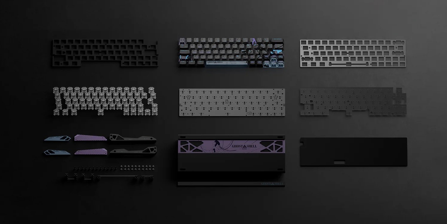 Components of a mechanical keyboard are laid out, including keycaps with 'GHOST IN THE SHELL' branding, switches, a purple and black back panel, and various frames and plates.