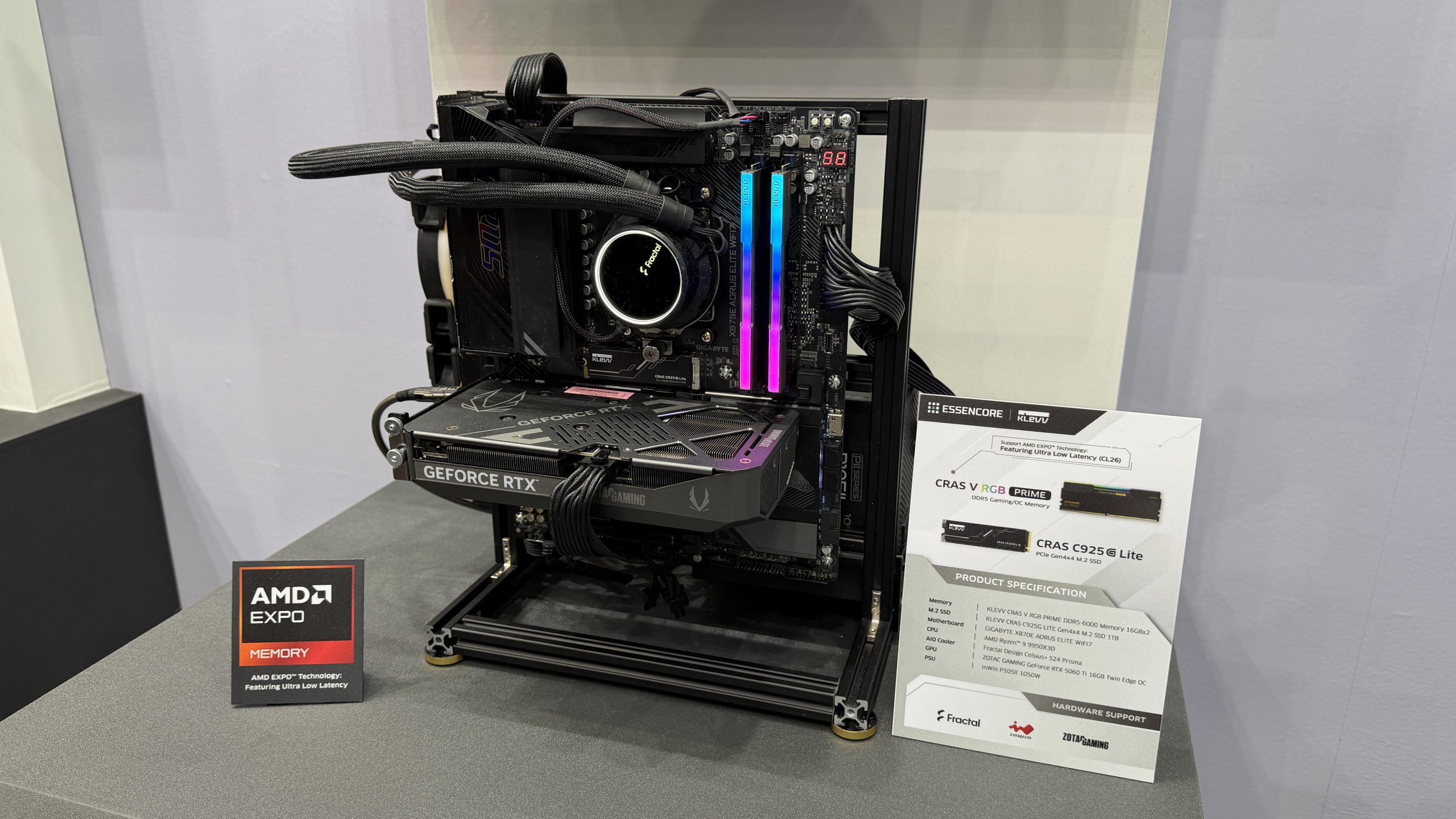 A custom-built PC setup showcases a GeForce RTX graphics card, KLEVV Cras V RGB Prime memory modules, and an AMD Expo 'MEMORY' label, with an accompanying product specification sheet.