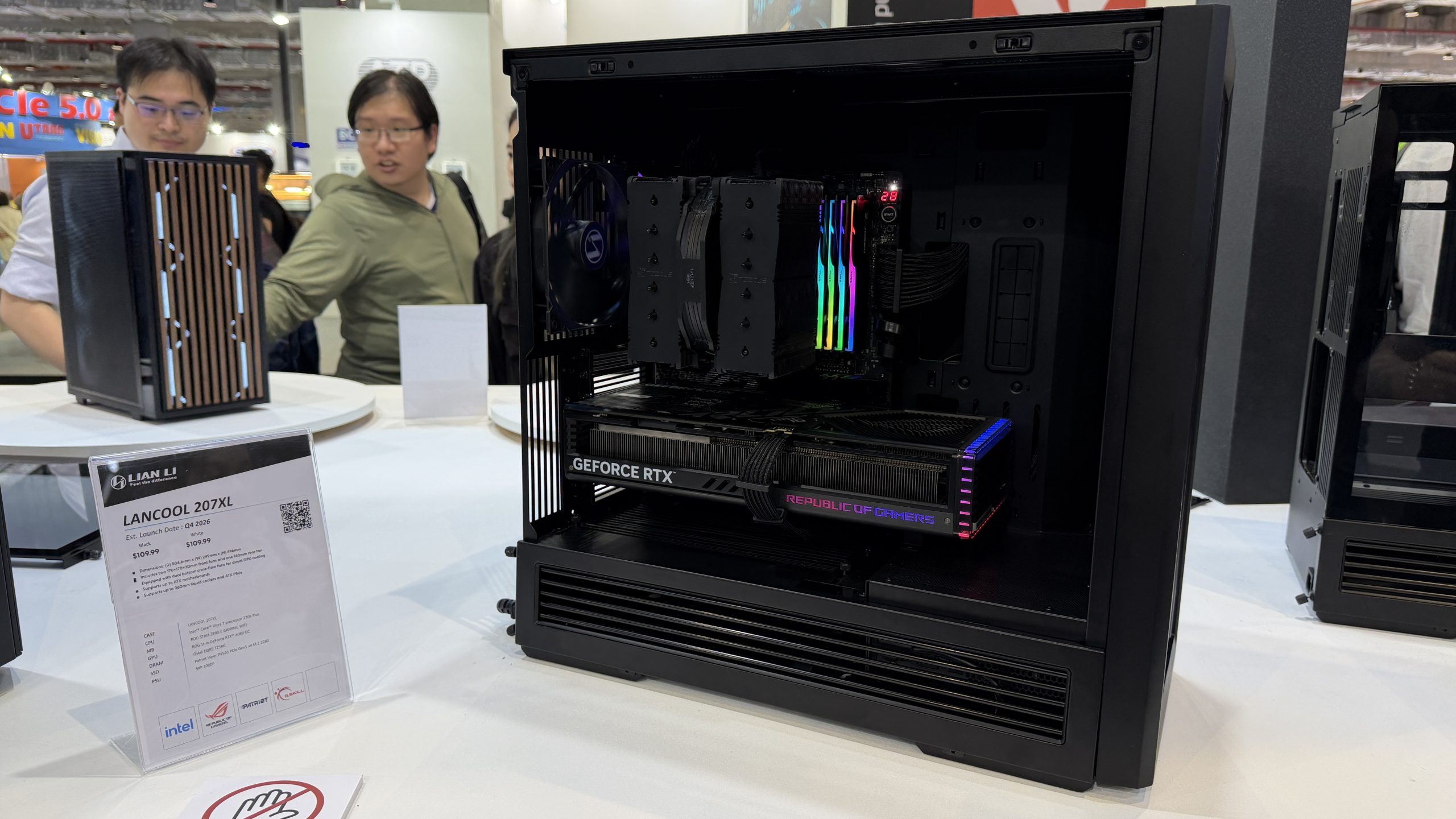 A Lian Li LANCOOL 207XL case displays a NVIDIA GeForce RTX GPU and an ASUS Republic of Gamers component, with RGB lighting visible inside.