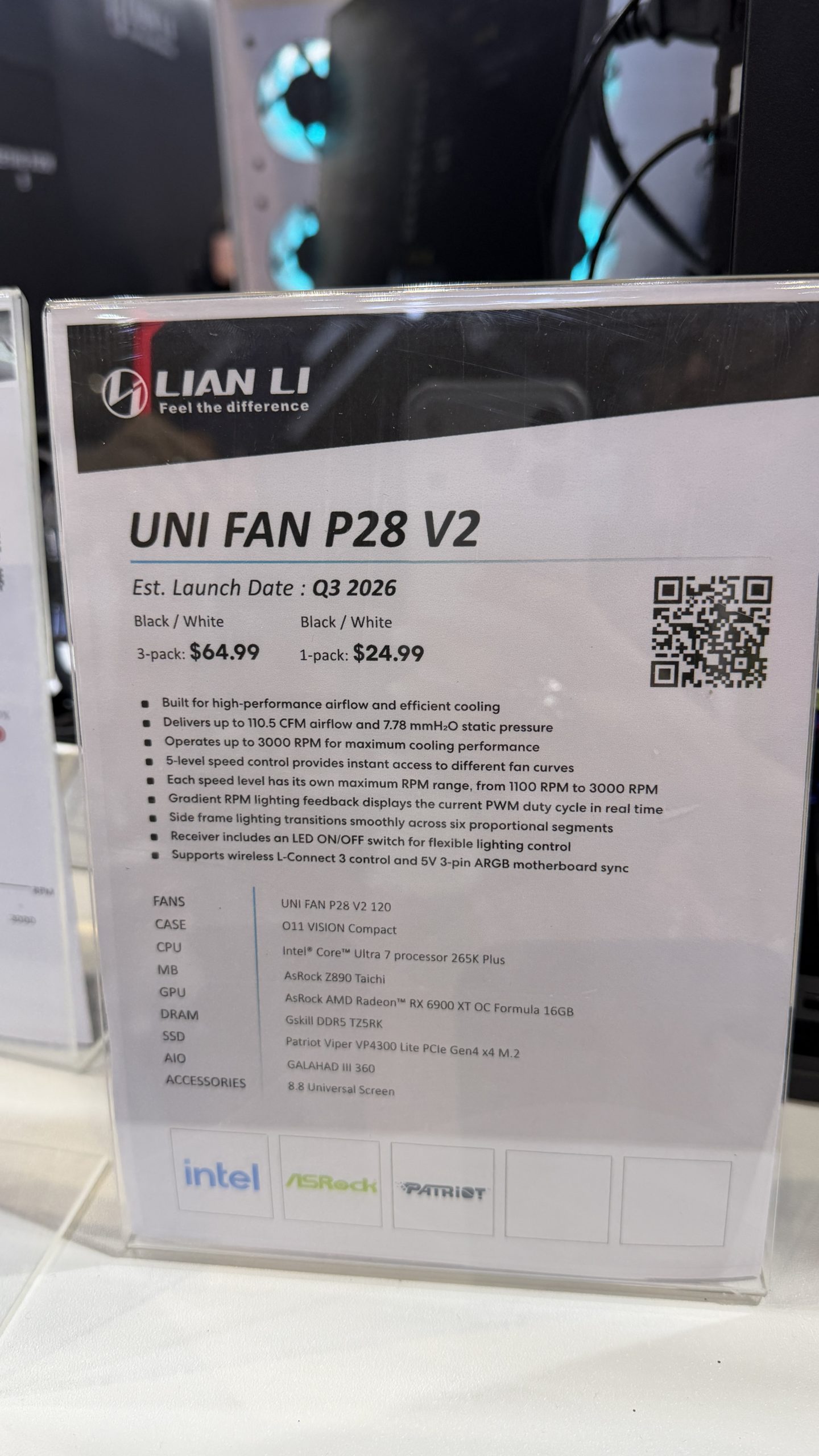 A display showcasing the Lian Li 'UNI FAN P28 V2' with launch details and specifications, including prices for a 3-pack ($64.99) and 1-pack ($24.99), alongside logos of Intel, ASRock, and Patriot.