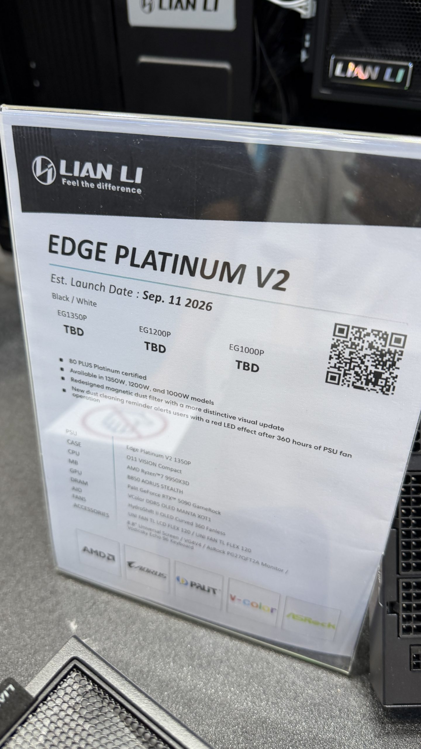 A Lian Li display showing details for the 'EDGE PLATINUM V2' power supply, with models EG1350P, EG1200P, and EG1000P set to launch on 'Sep. 11 2026', featuring 80 PLUS Platinum certification and a redesigned magnetic dust filter.