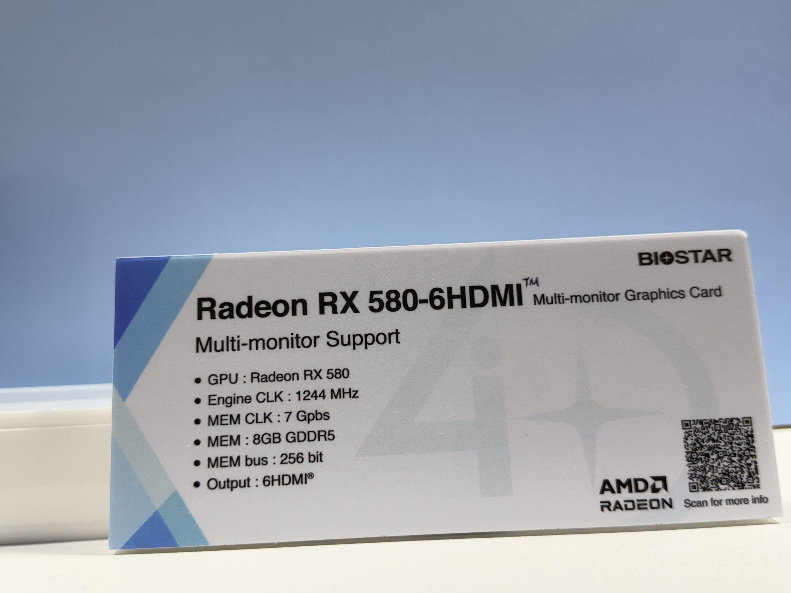 A Biostar display card details the Radeon RX 580-6HDMI graphics card specs, featuring multi-monitor support, 1244 MHz engine clock, 7 Gbps memory clock, 8GB GDDR5 memory, 256-bit memory bus, and 6 HDMI outputs.