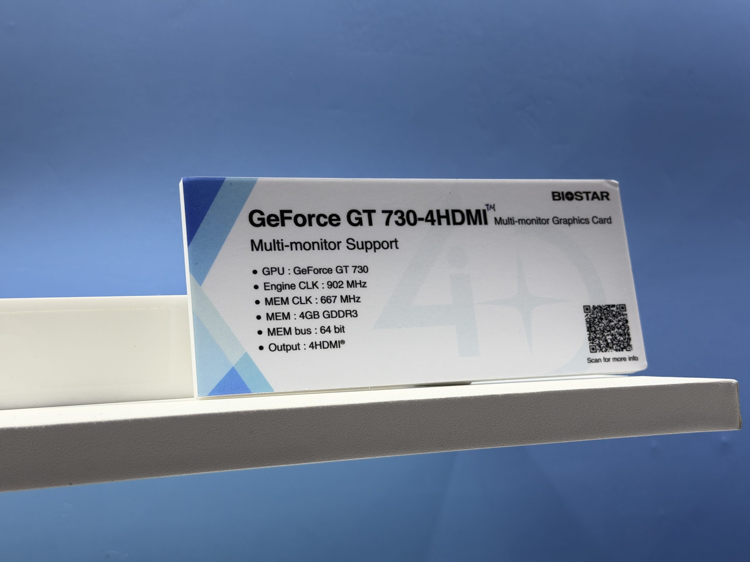 A Biostar card detailing the 'GeForce GT 730-4HDMI' with multi-monitor support shows specifications including 902 MHz engine clock, 667 MHz memory clock, 4GB GDDR3, 64-bit memory bus, and '4HDMI' output.