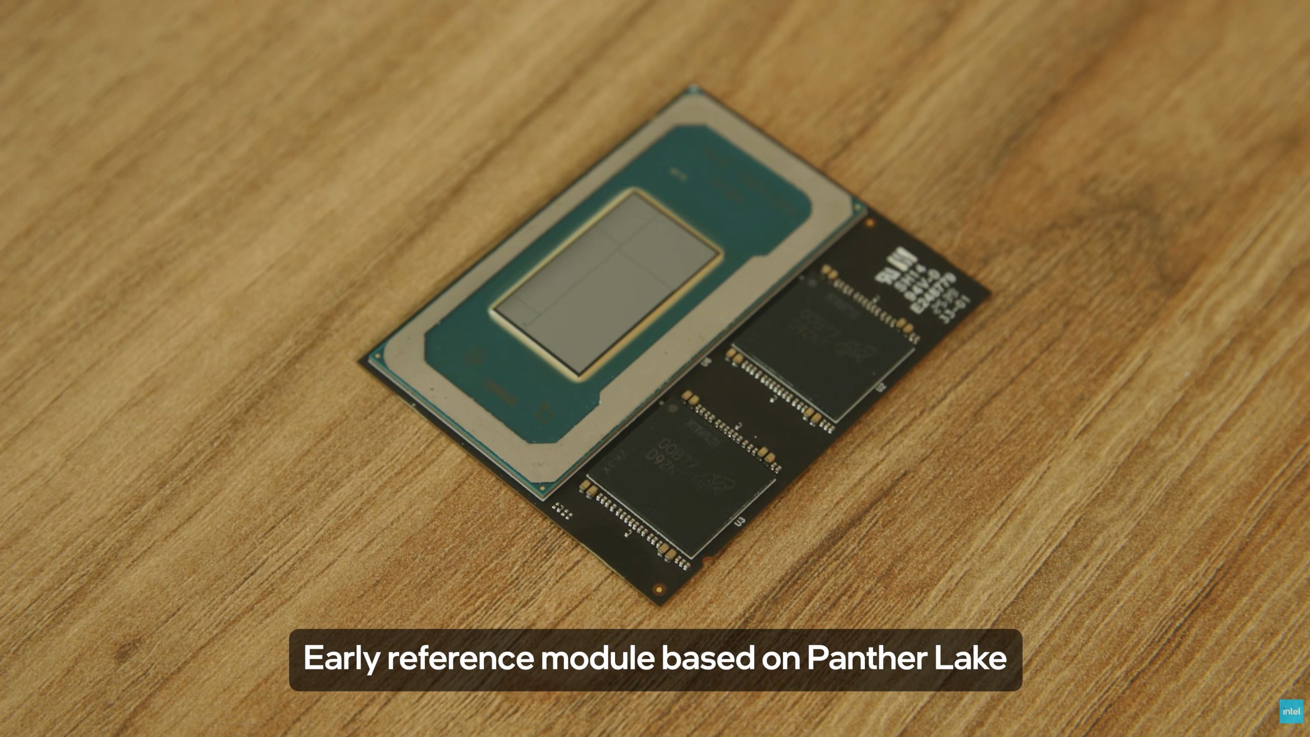 An Intel early reference module based on 'Panther Lake' is shown on a wooden surface.