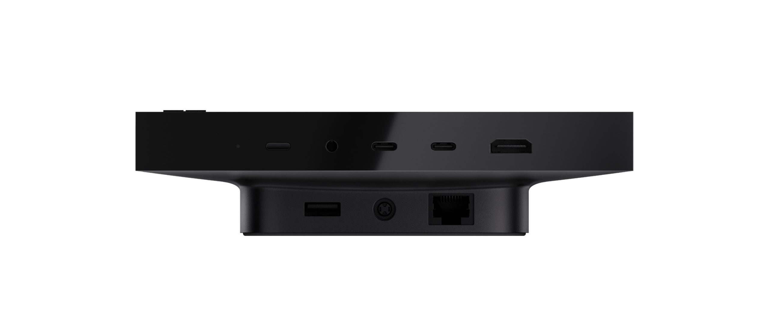 A black device with multiple ports including USB-C, HDMI, and Ethernet, viewed from the rear.