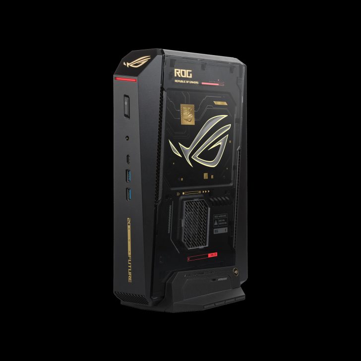 An ASUS ROG (Republic of Gamers) gaming desktop with a black and gold design, featuring the ROG logo and several USB ports on the front panel.