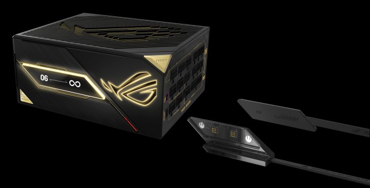 ASUS ROG Thor 3000W Platinum II power supply with illuminated logo and modular connectors on display.
