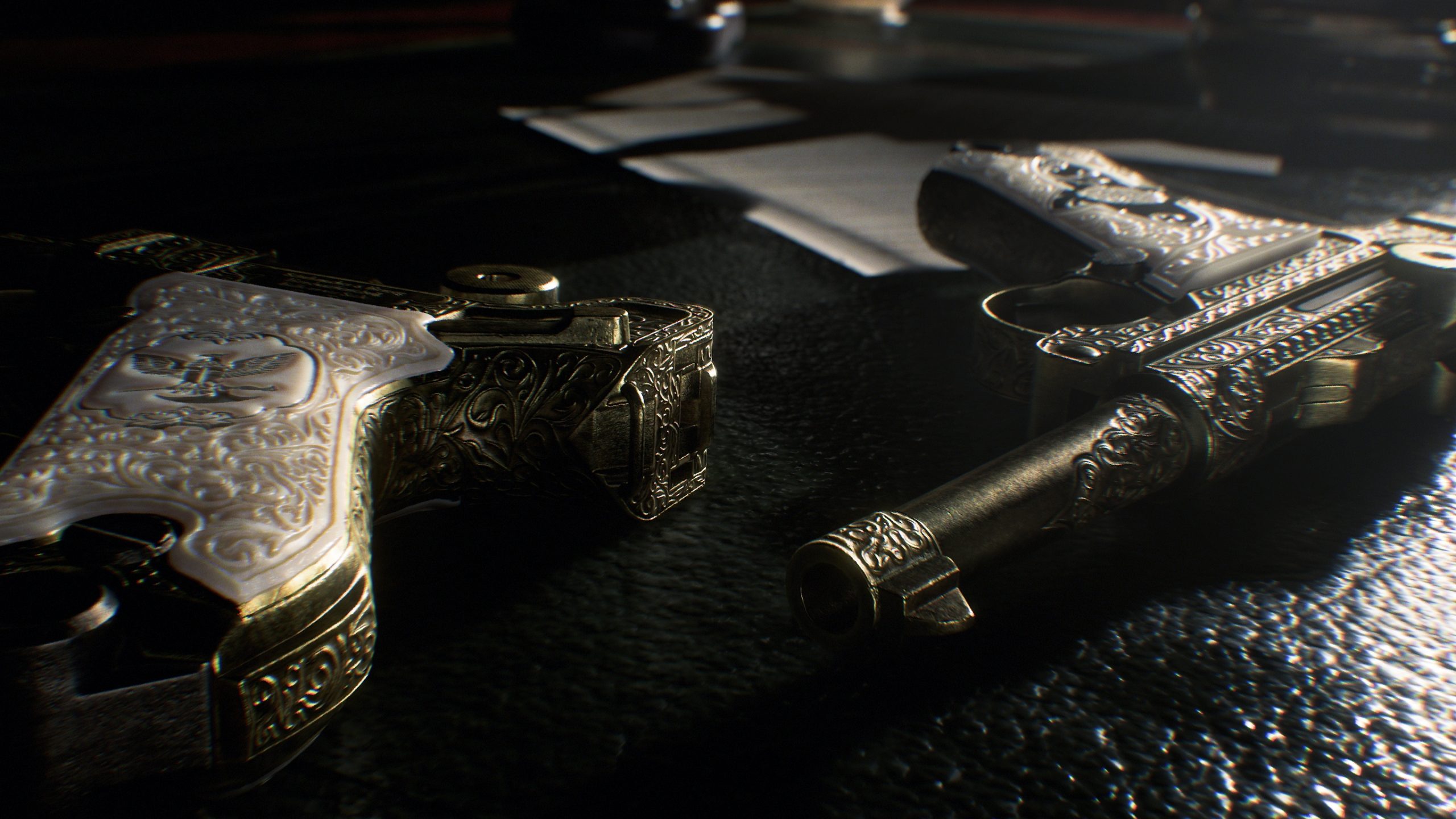 Two intricately engraved pistols with ornate grips are displayed on a dark surface, alongside scattered papers.