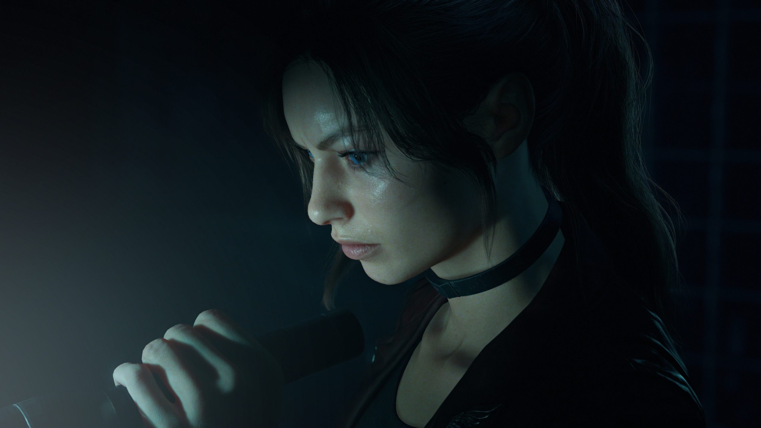 A character from the game Resident Evil holding a flashlight in a dark setting.
