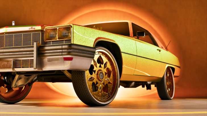 A vintage car with the brand Albany is shown with ornate gold alloy wheels against a glowing orange background.